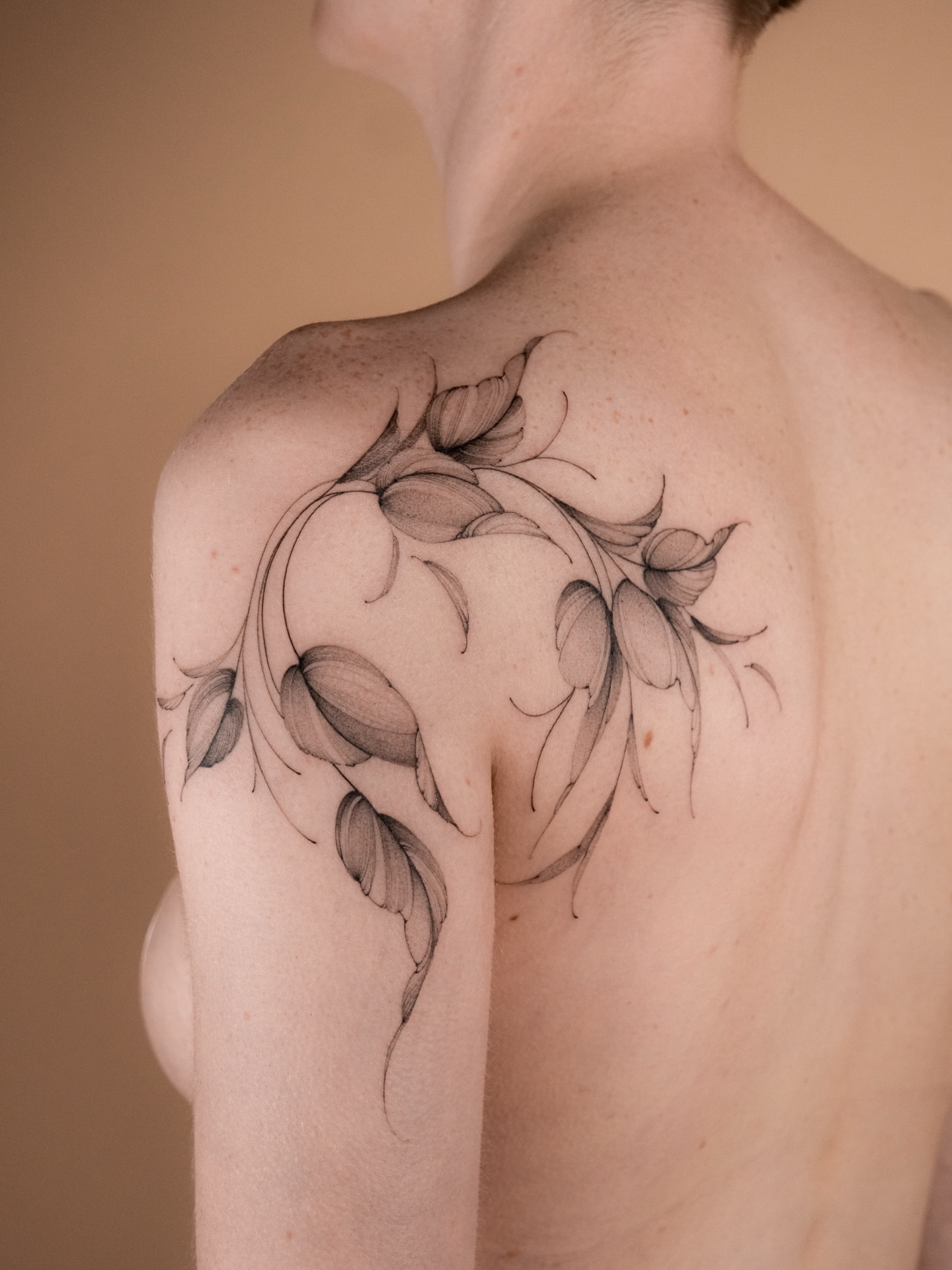 Floral vine black and grey tattoo on the shoulder by i flower you