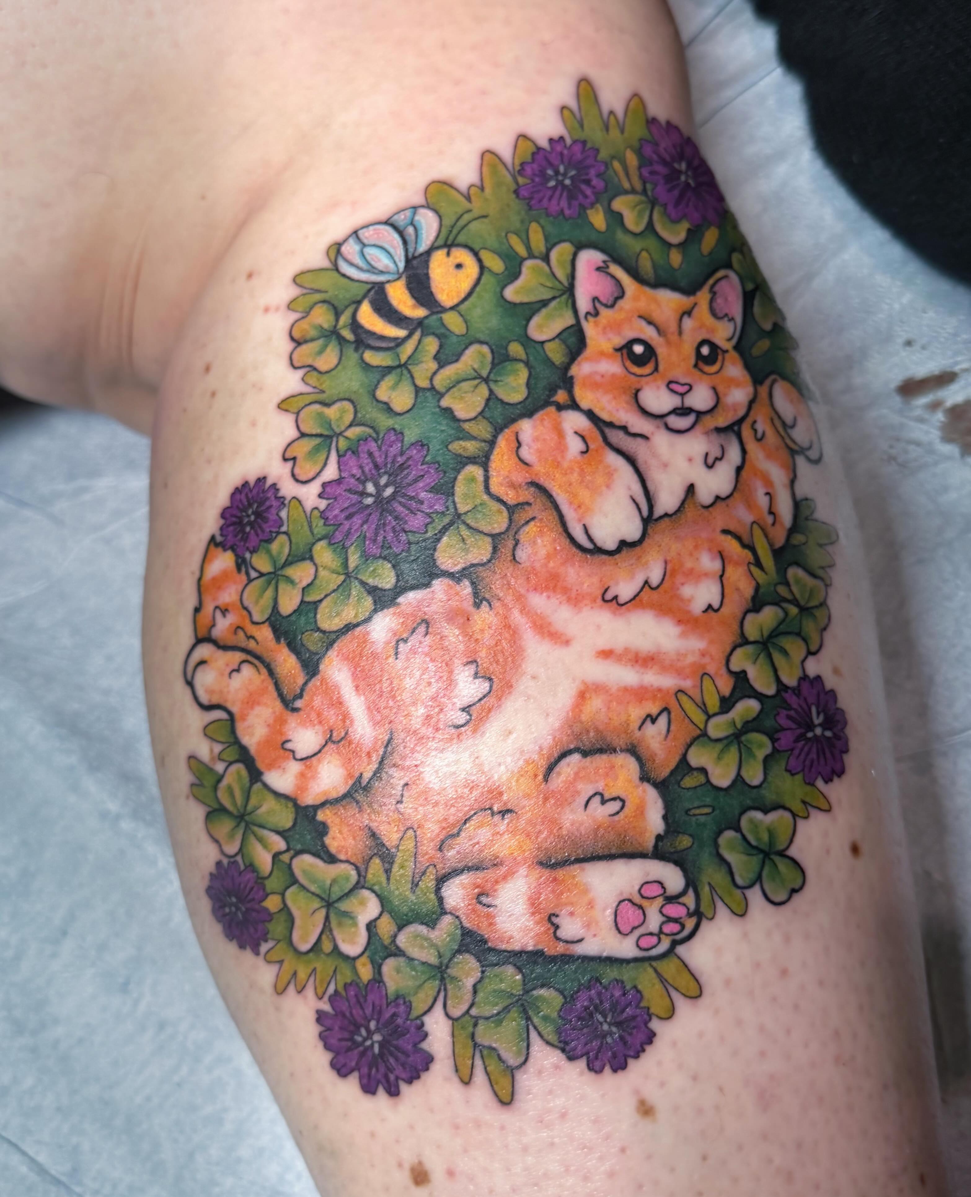 Cat and flowers new school tattoo on the thigh by rocky love