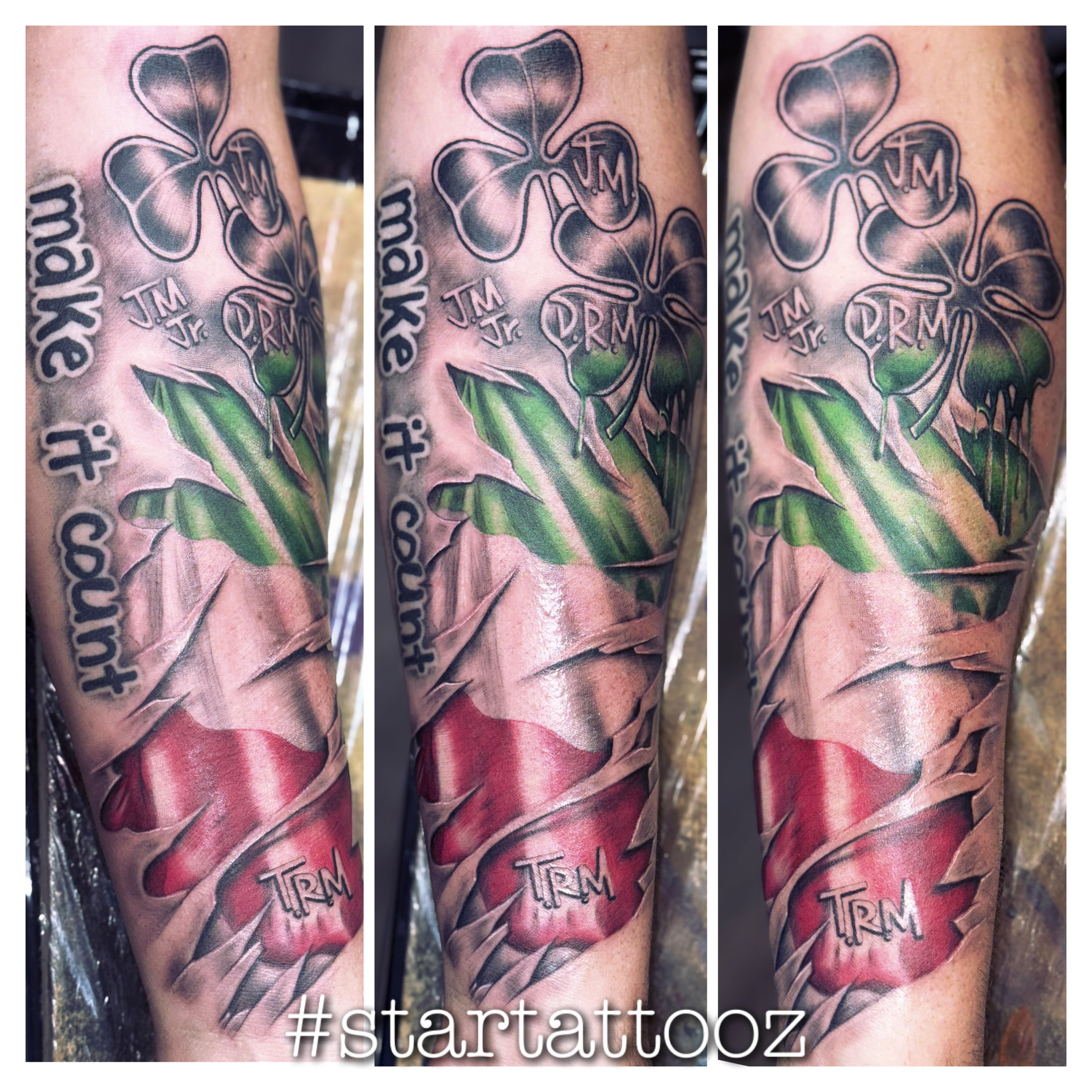 Clover with text black and grey tattoo on the forearm by StarTattooz - the one & only