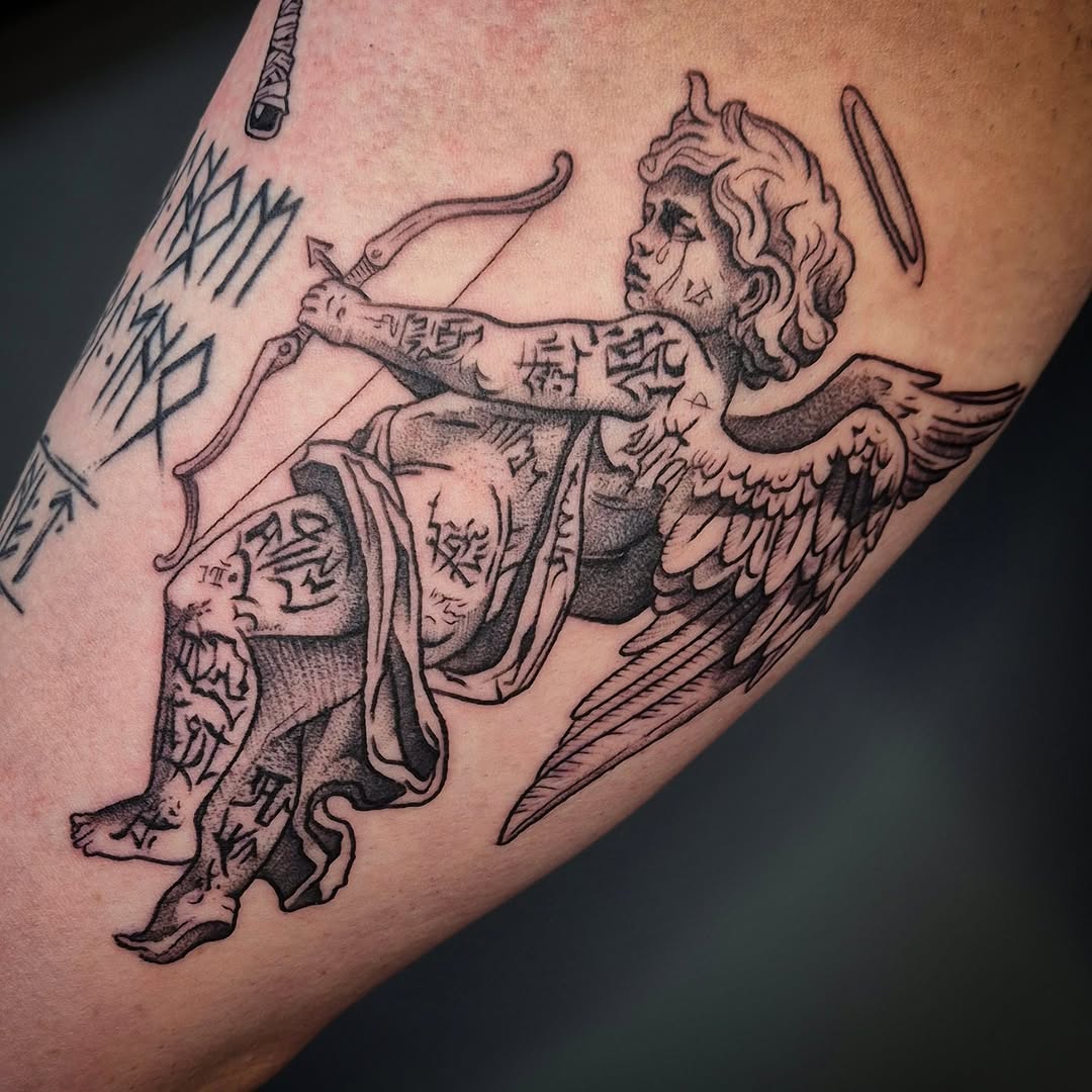 Cupid with bow and arrow realism tattoo on the forearm by Тату Херсон _ Kherson tattoo, Kherson