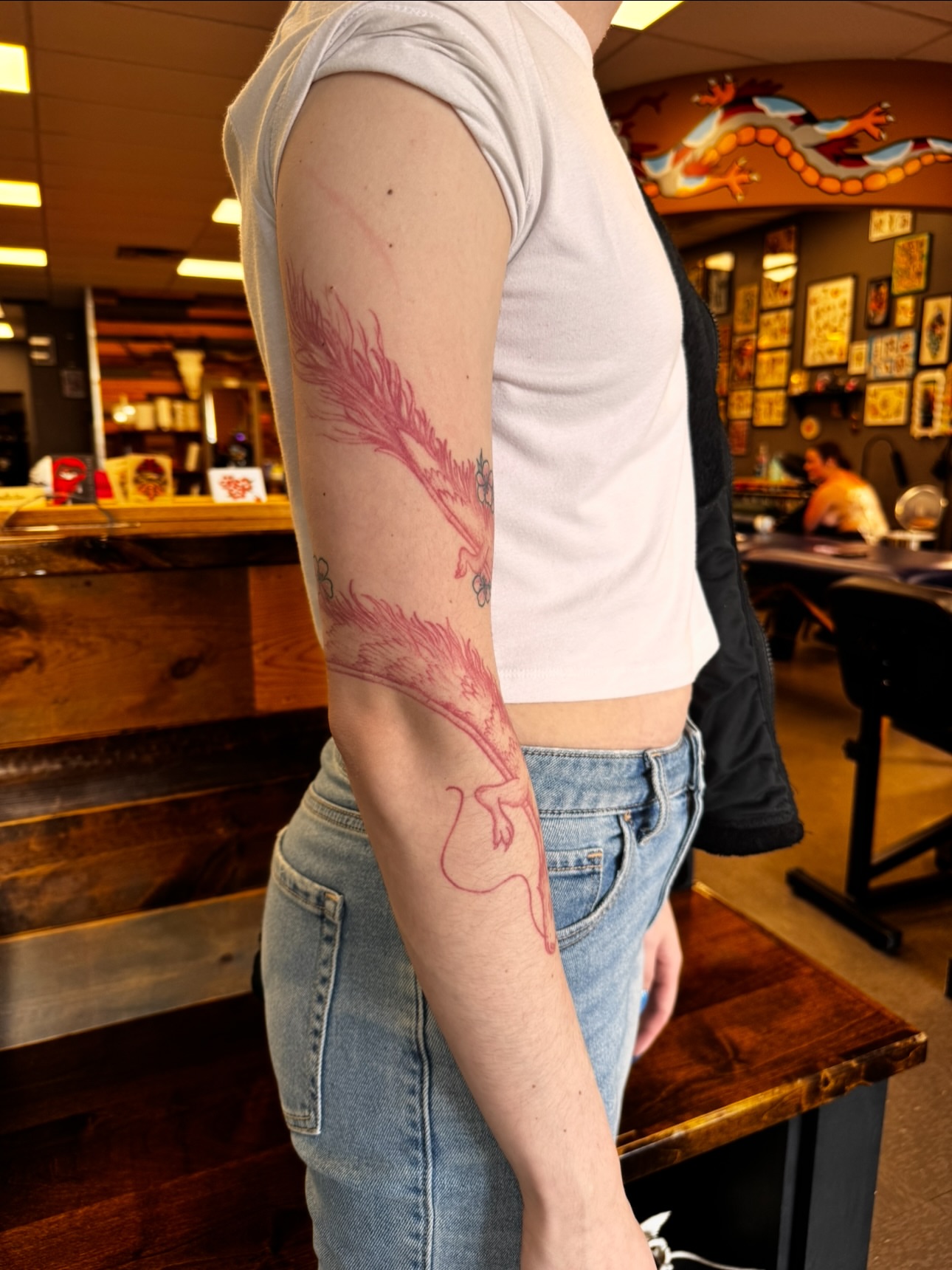 Dragon American traditional tattoo on the forearm by Brad Snow