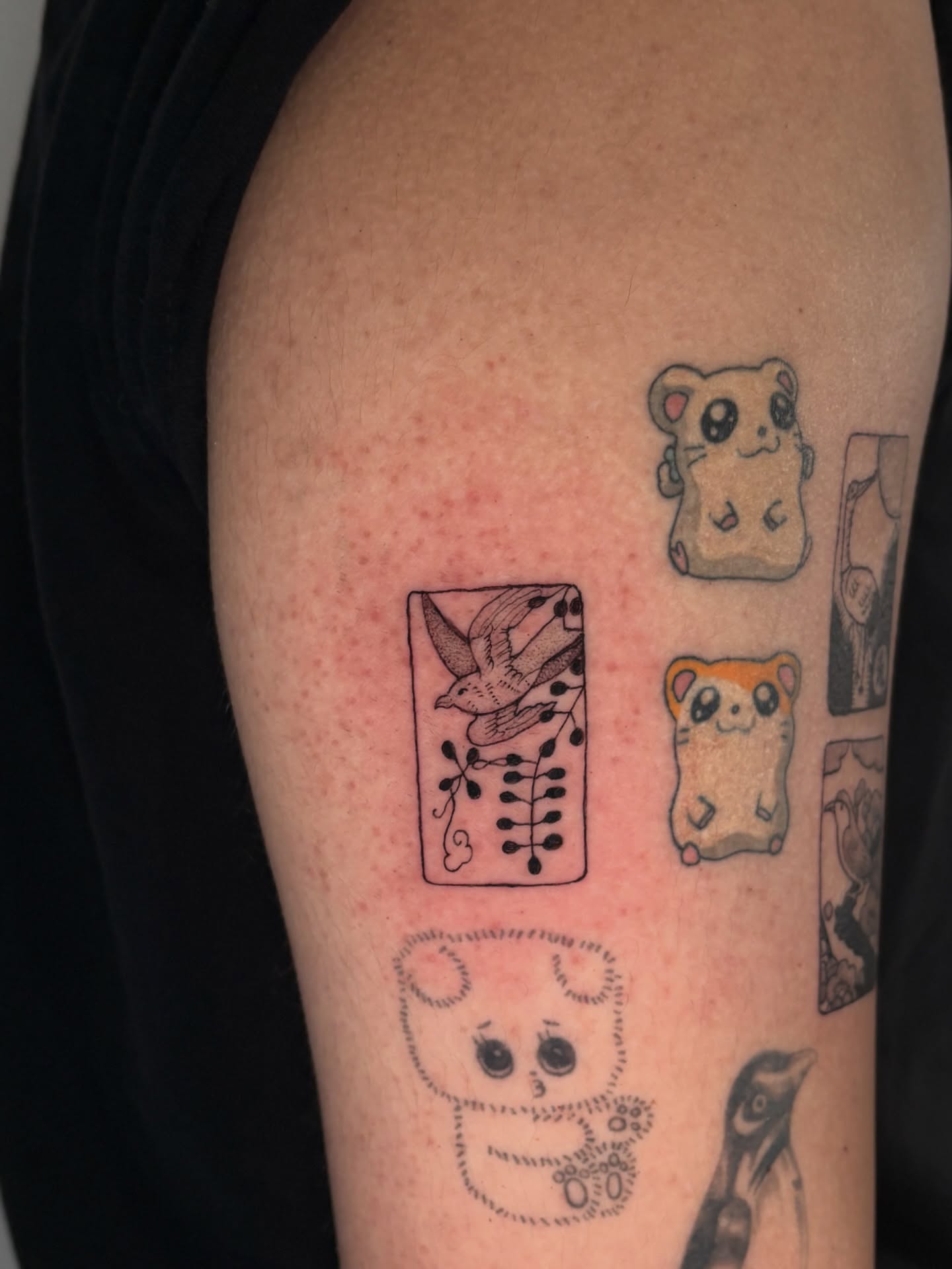 Hamsters and birds dotwork tattoo on the upper arm by Chloe Shay