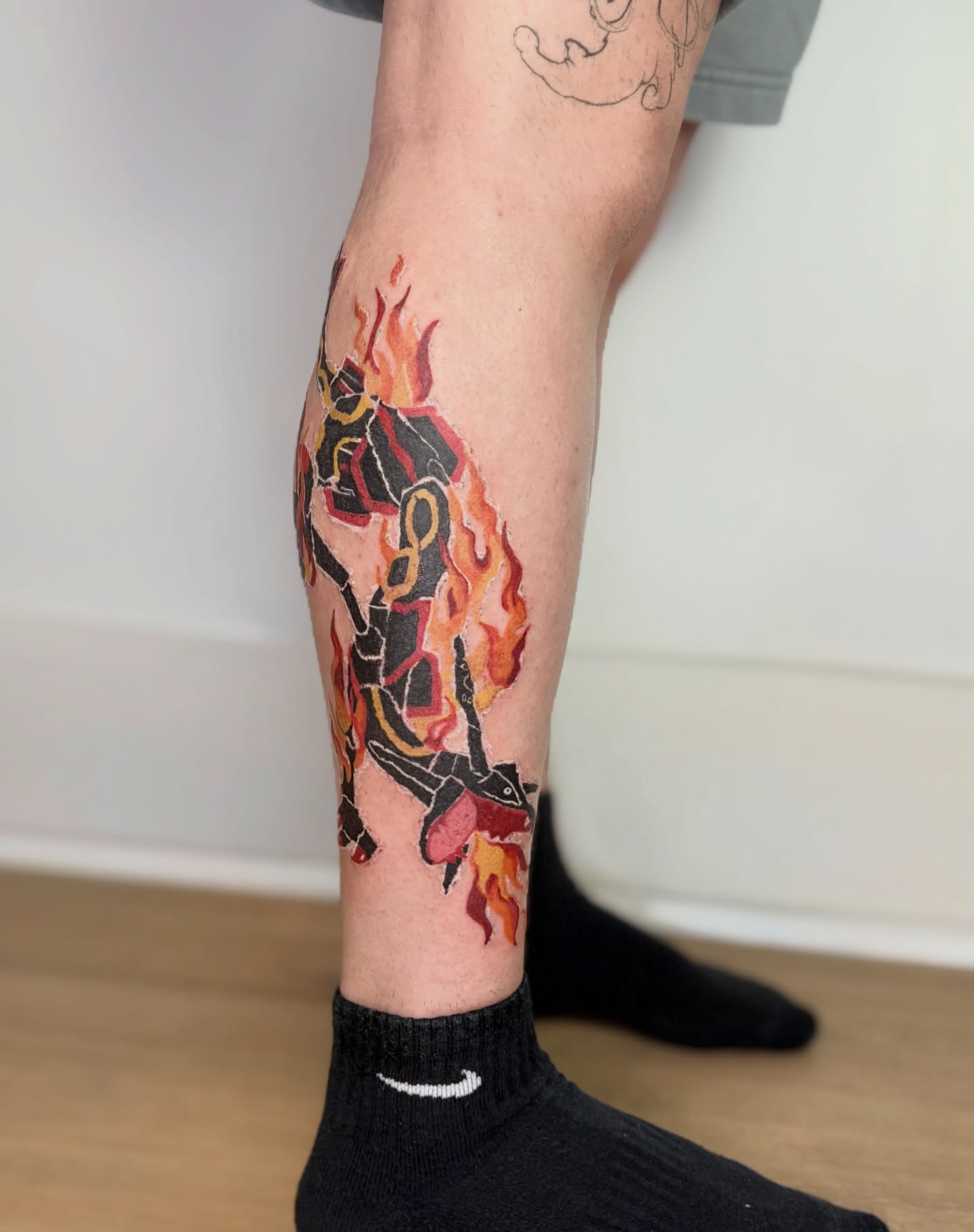 Flaming sword neo-traditional tattoo on the calf by Rami, Maden🇰🇷
