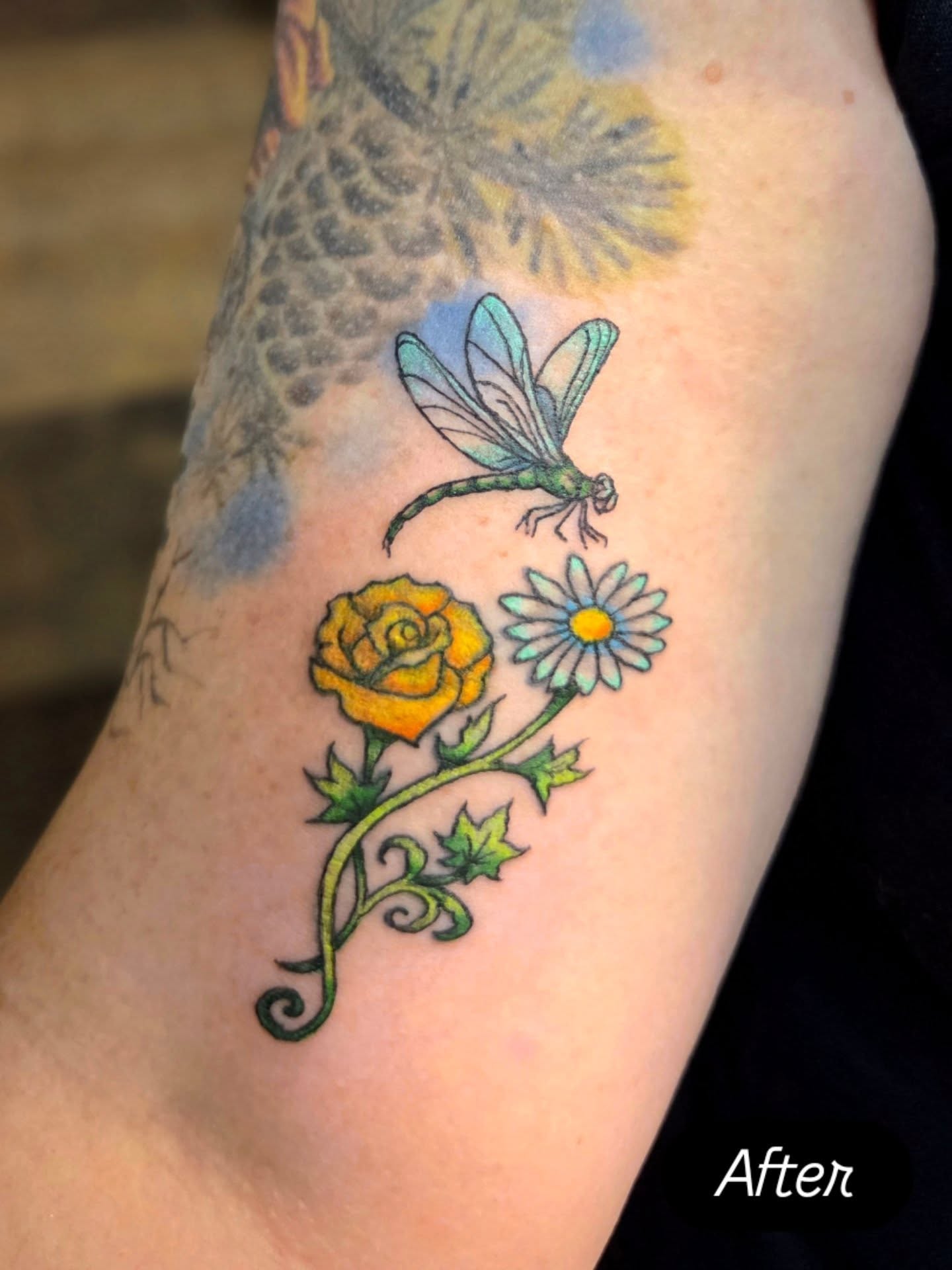 Dragonfly and flowers new school tattoo on the forearm by Courtney, Lakewood, Ohio