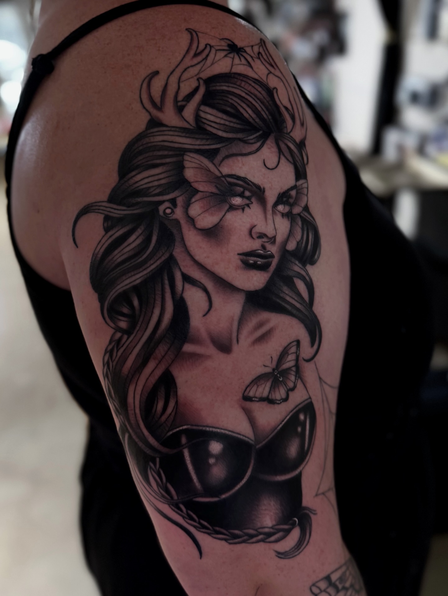 Woman with butterfly realism tattoo on the shoulder by Sacramento Tattoos (Ilona)