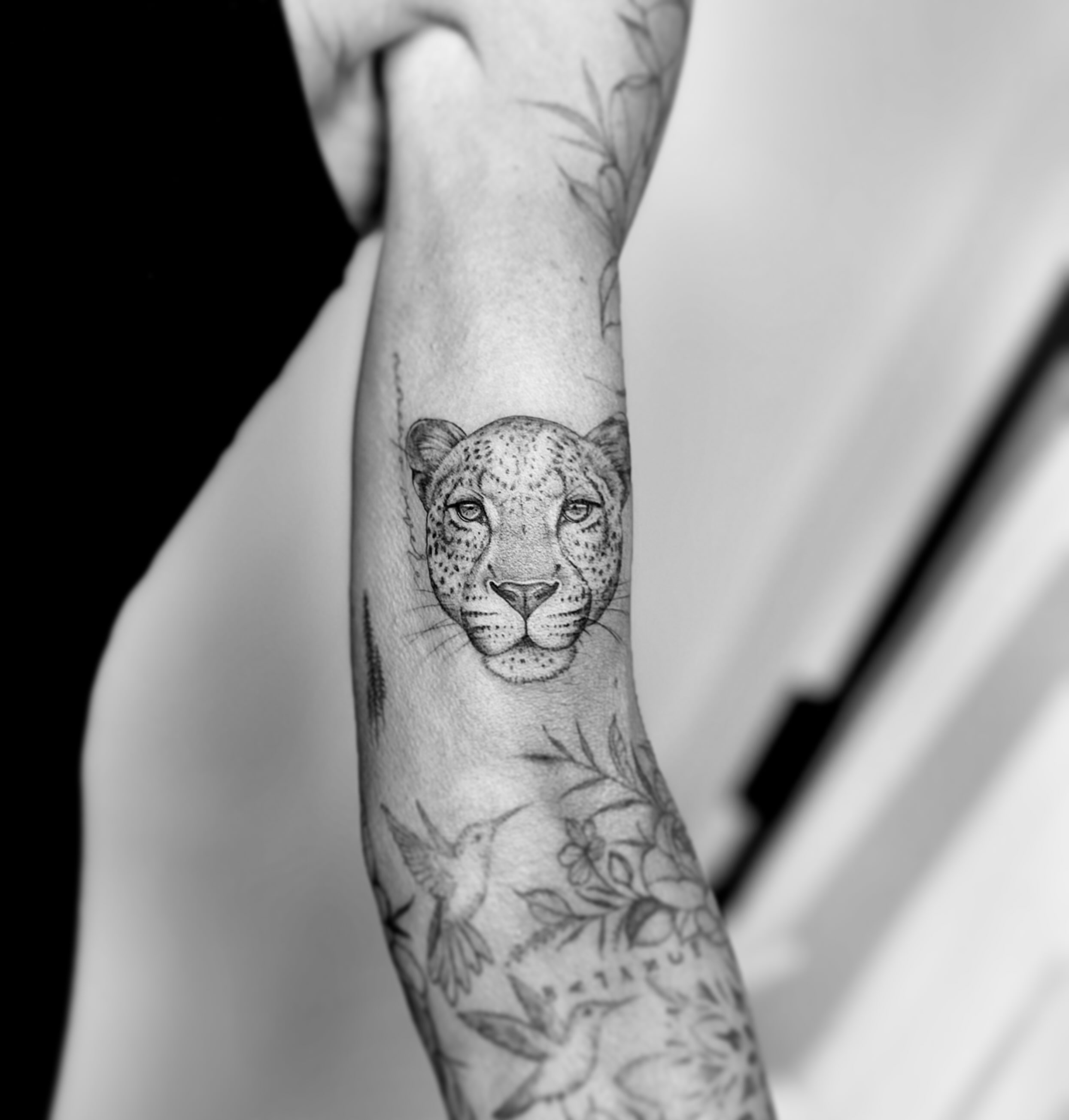 Leopard head realism tattoo on the forearm by L i v π Tattoo Artist. AMITY TATTOO