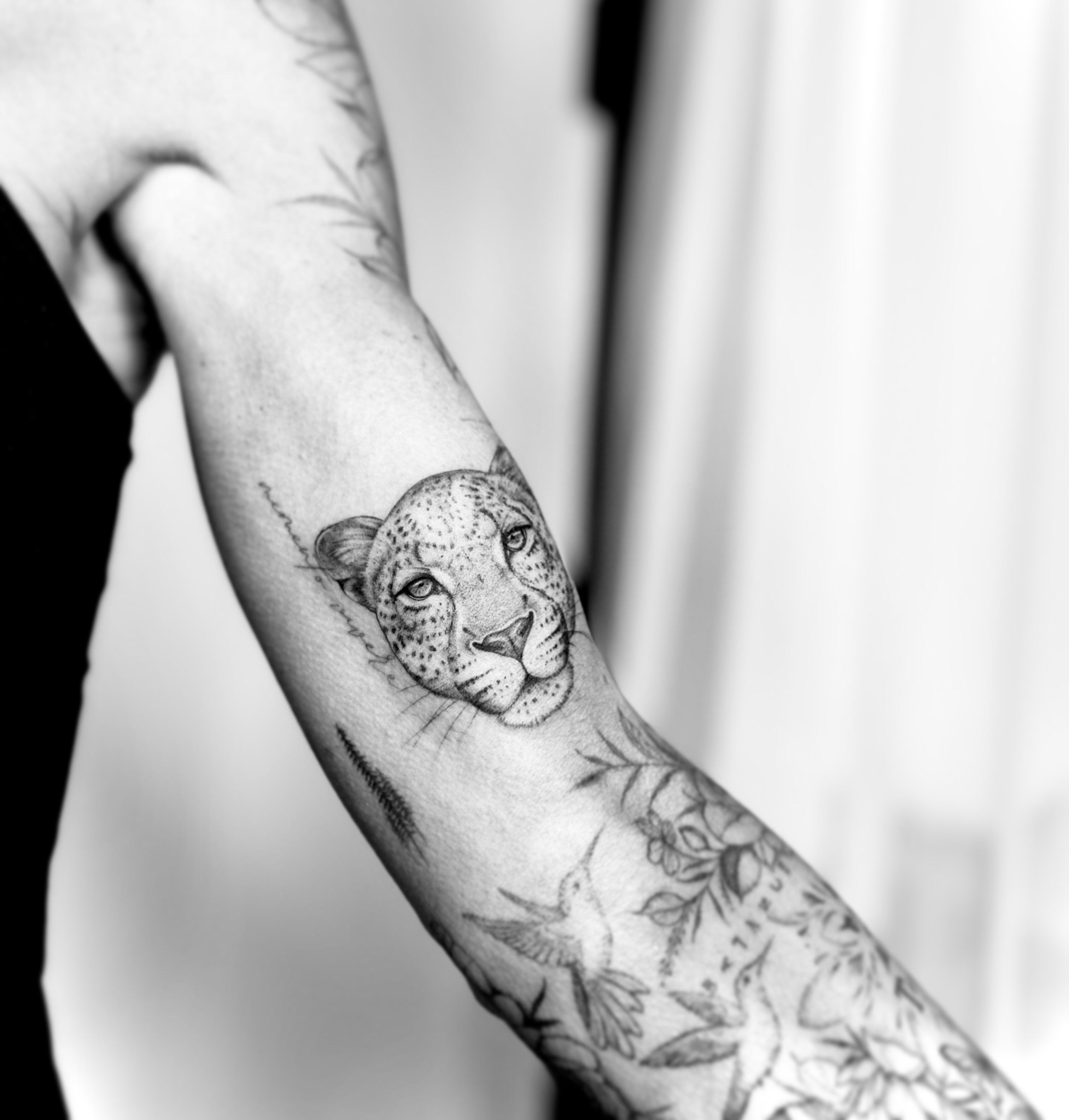 Leopard realism tattoo on the forearm by L i v π Tattoo Artist. AMITY TATTOO