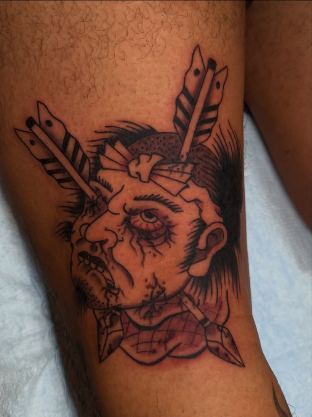 Indian warrior American traditional tattoo on the thigh by Tyler Brown, San Diego, California