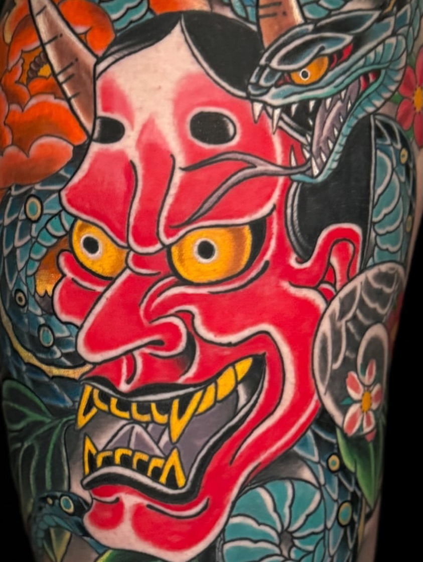 Demon mask japanese irezumi tattoo on the forearm by Chris Cockrill