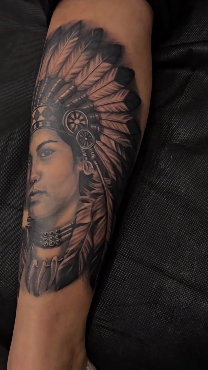 Woman in headdress realism tattoo by Richie Garcia, Hesperia, California