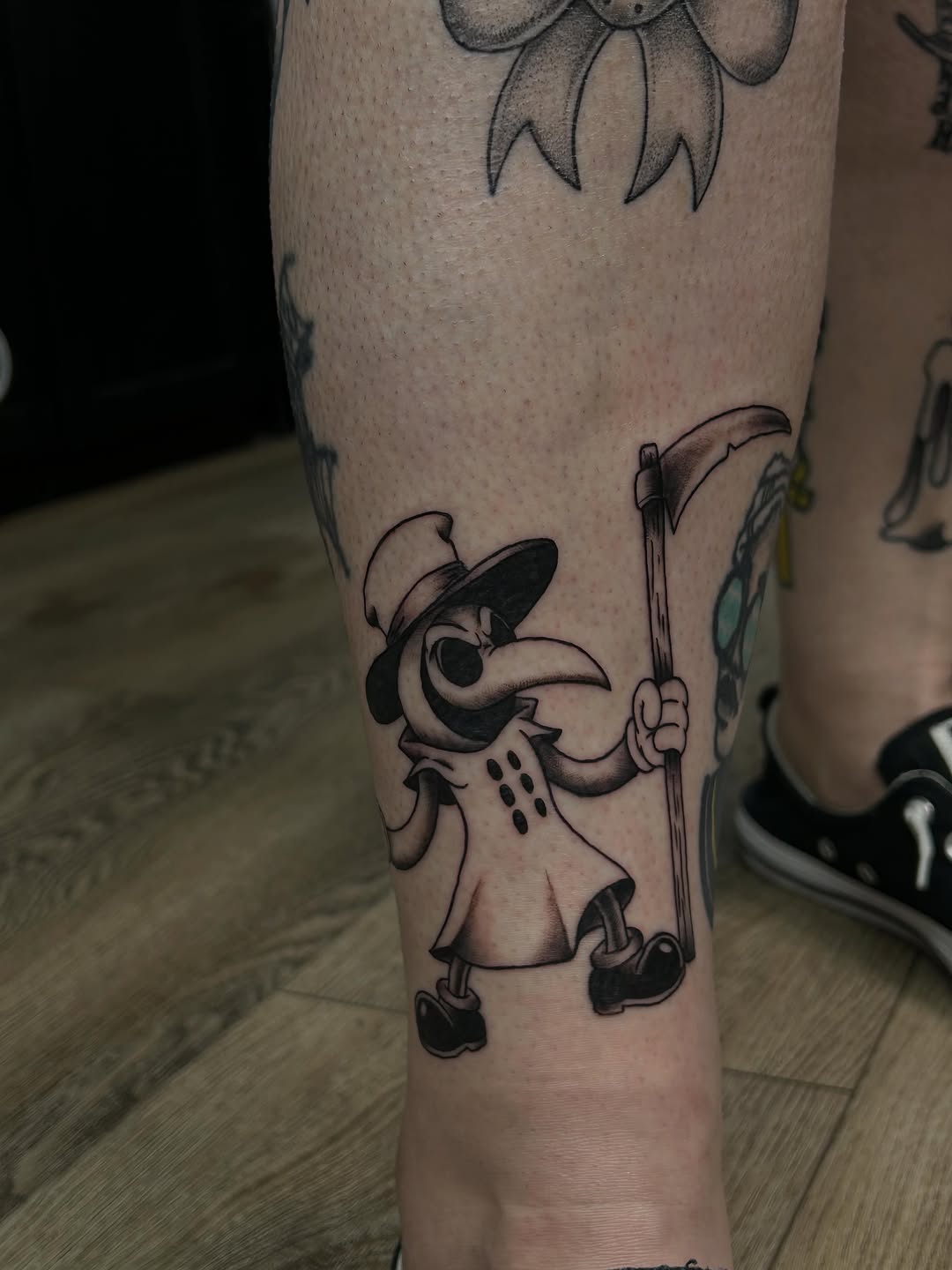 Plague doctor with scythe surrealism tattoo on the forearm by ꧁༺𝔅𝔦𝔤 ℭ𝔥𝔲𝔫𝔤𝔲𝔷༻꧂, San Diego, California
