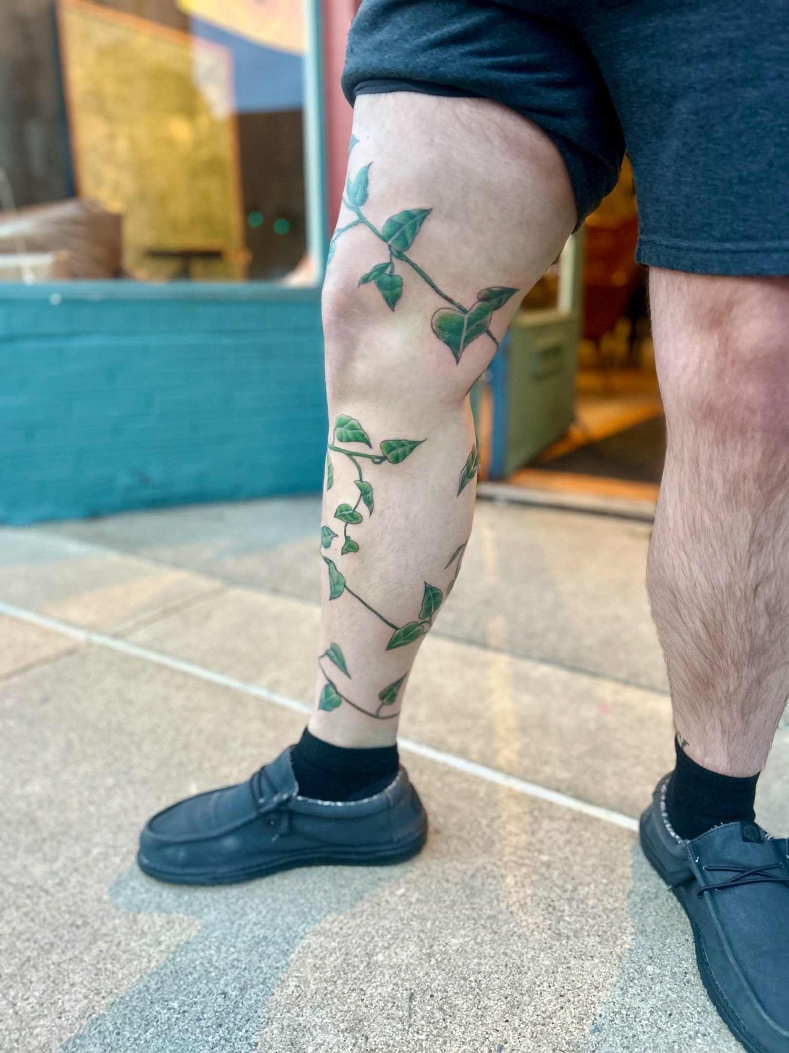 Vine dotwork tattoo on the calf by Tori Magill