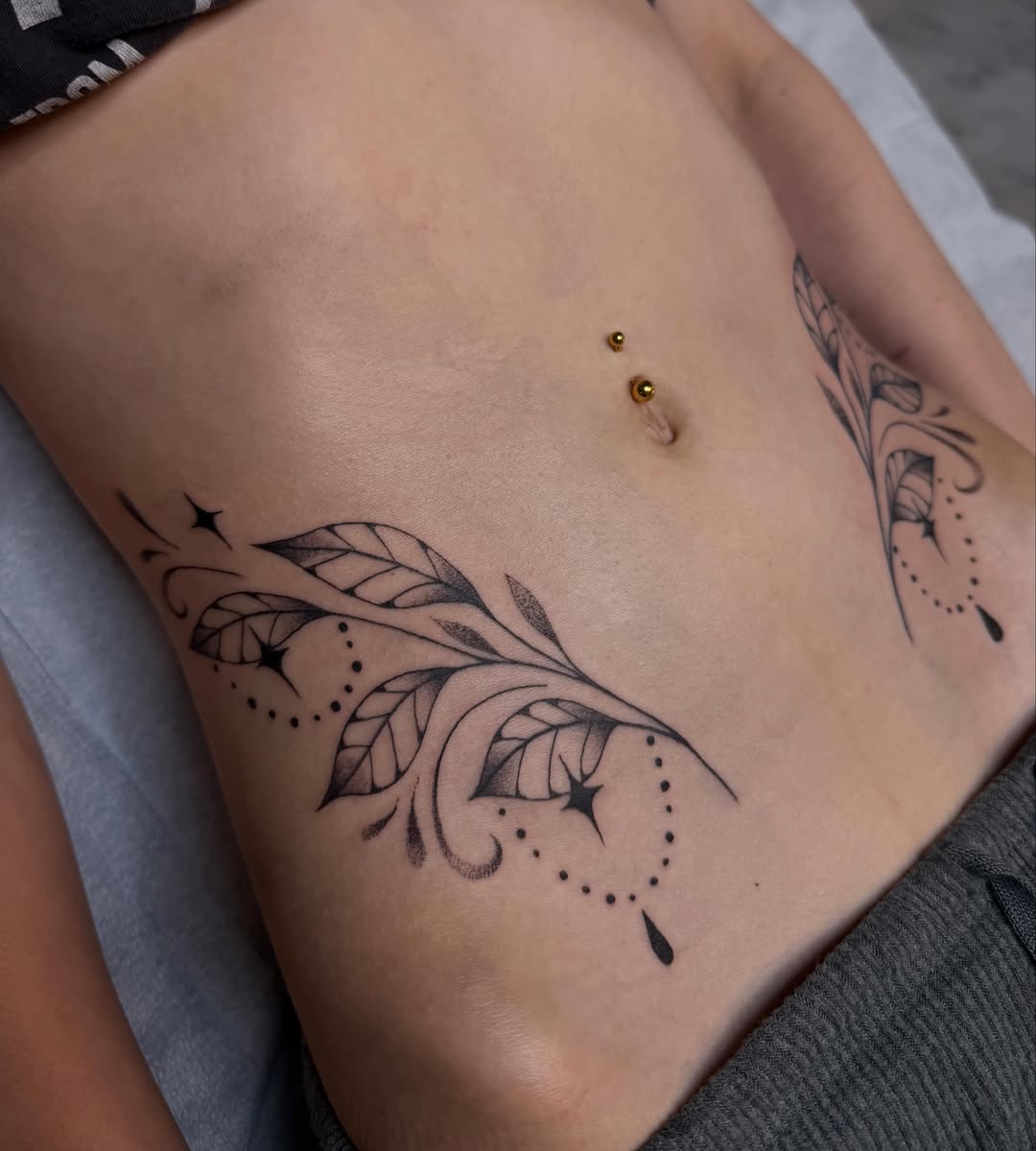 Tattoo by @elliemac.tattoos — dotwork, black_and_grey