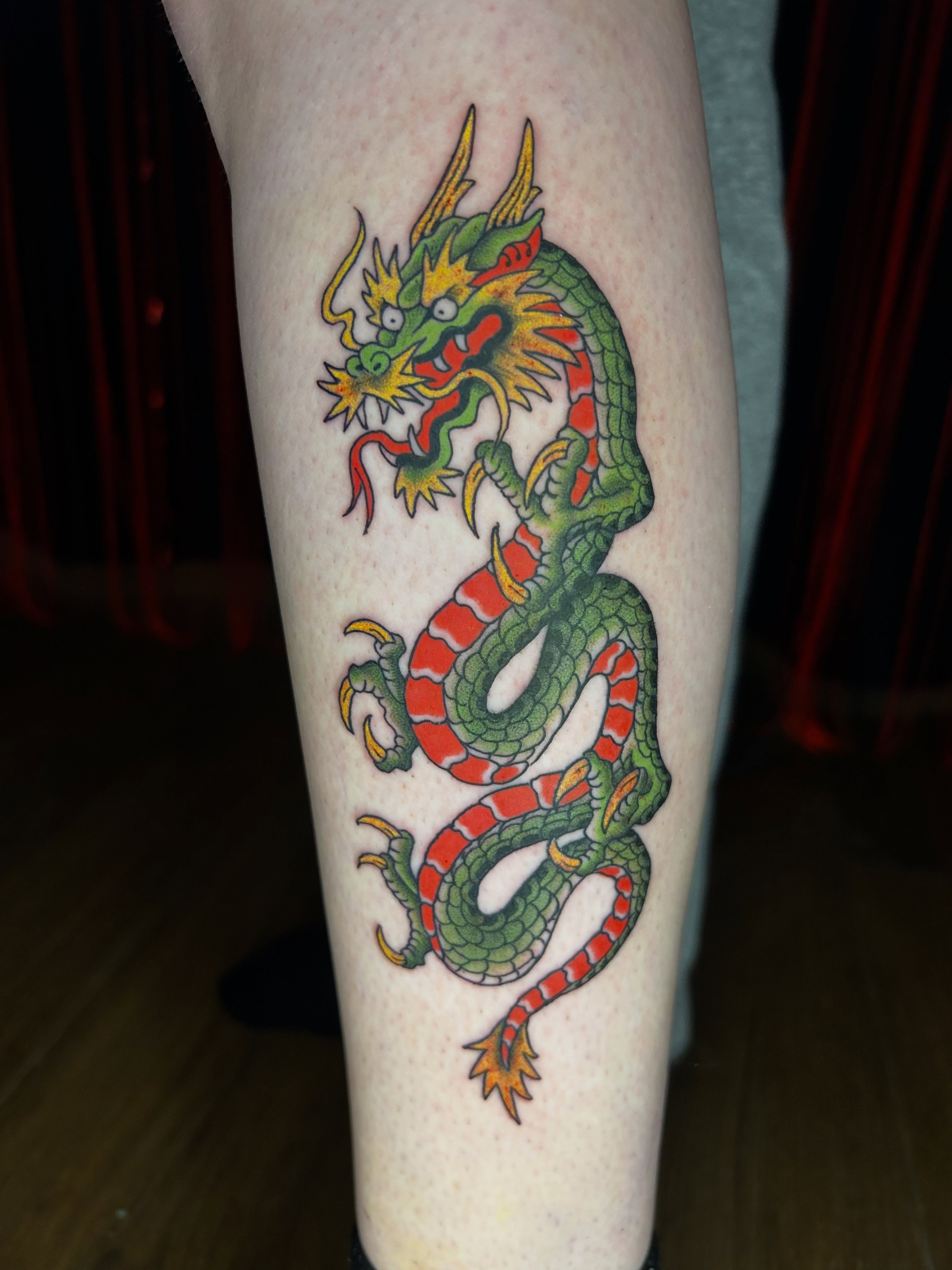 Dragon American traditional tattoo on the forearm by Kurt, Somerville, Massachusetts