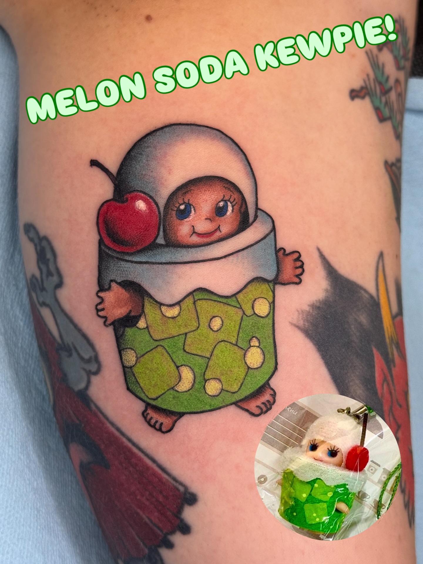 Melon soda kewpie dotwork tattoo on the forearm by Anna Wall