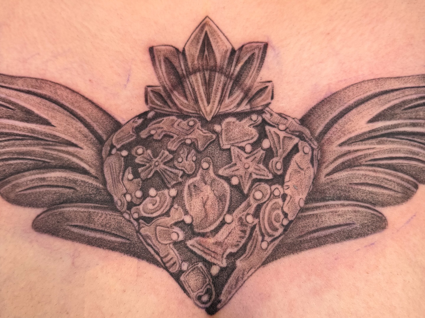 Mechanical heart geometric tattoo on the chest by @nudylicioustattoos