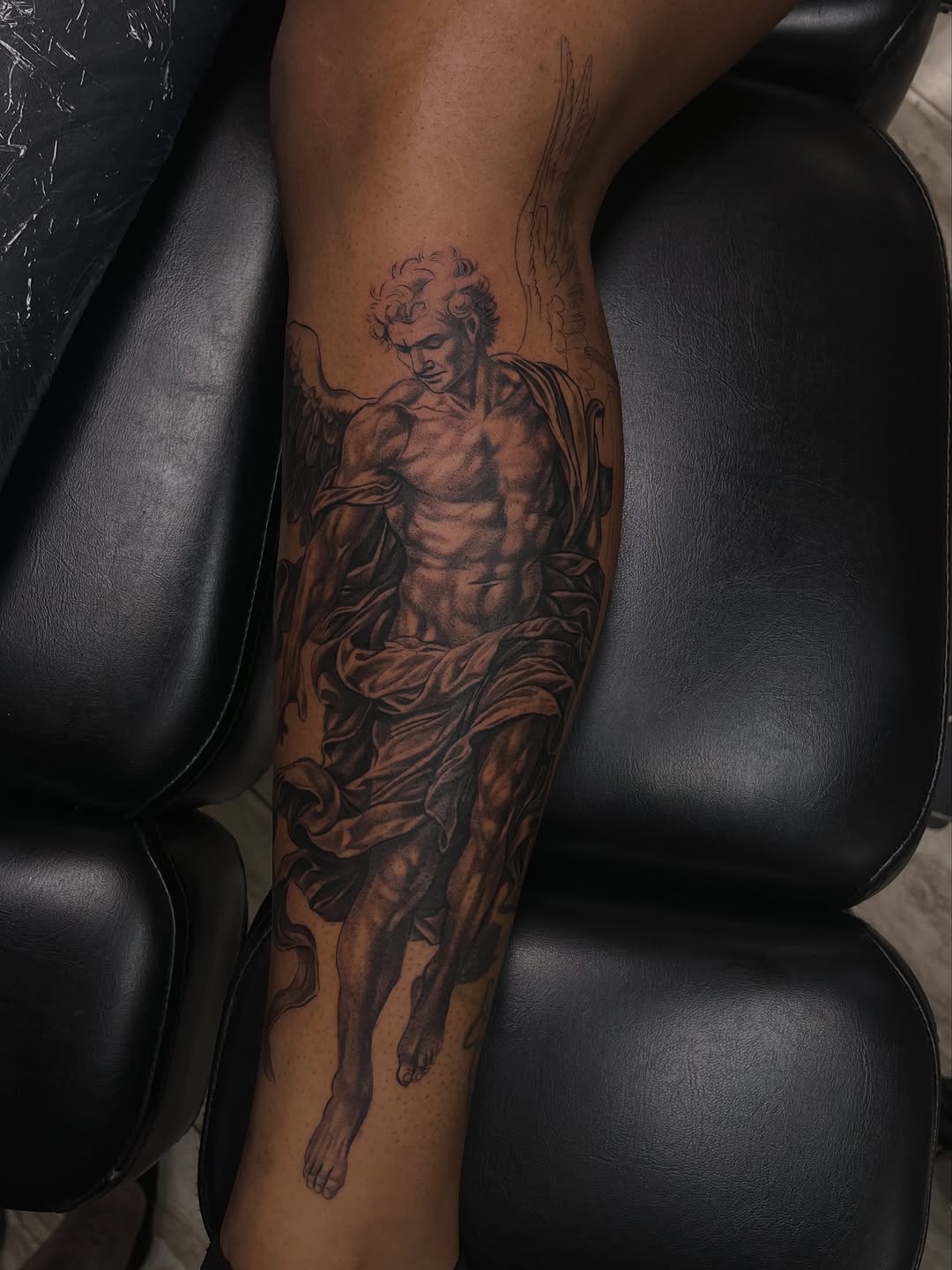 Angel realism tattoo on the forearm by Quinten Harper