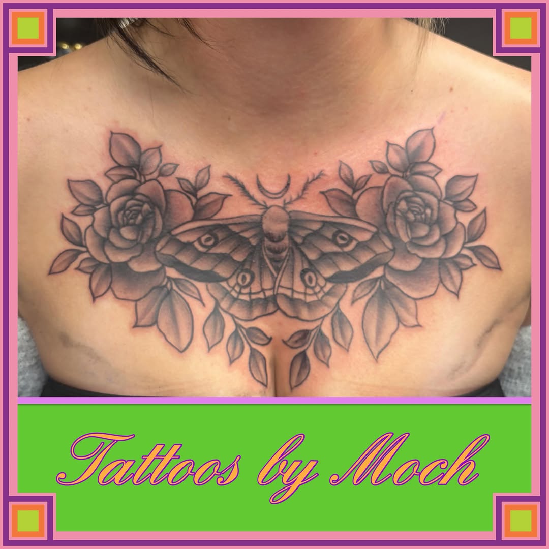 Butterfly and roses realism tattoo on the chest by Tattoos By Moch, Toledo, Ohio