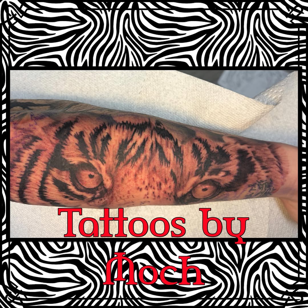 Tiger realism tattoo on the forearm by Tattoos By Moch, Toledo, Ohio