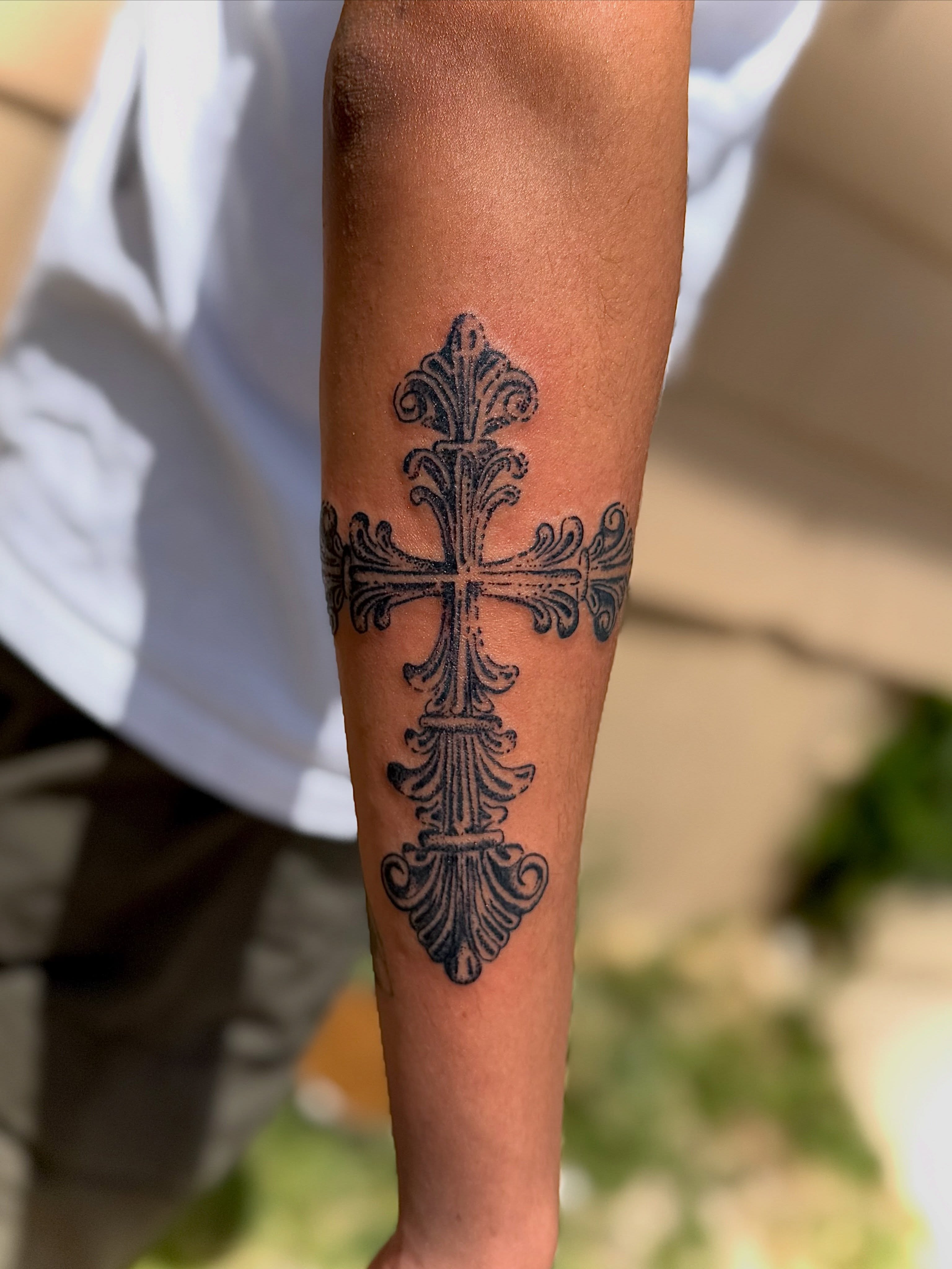 Cross black and grey tattoo on the forearm by Jocelyne ♡
