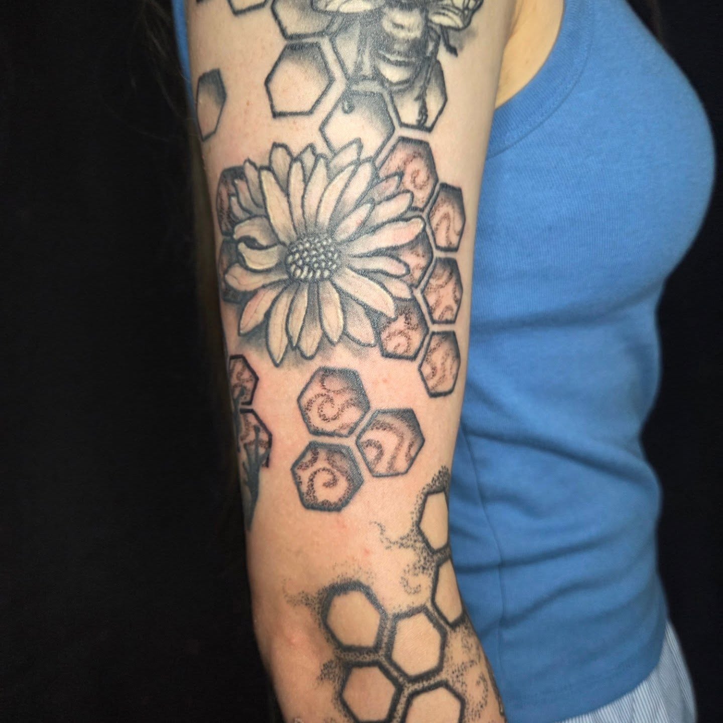 Geometric floral geometric tattoo on the forearm by Matthew Todd Kremer