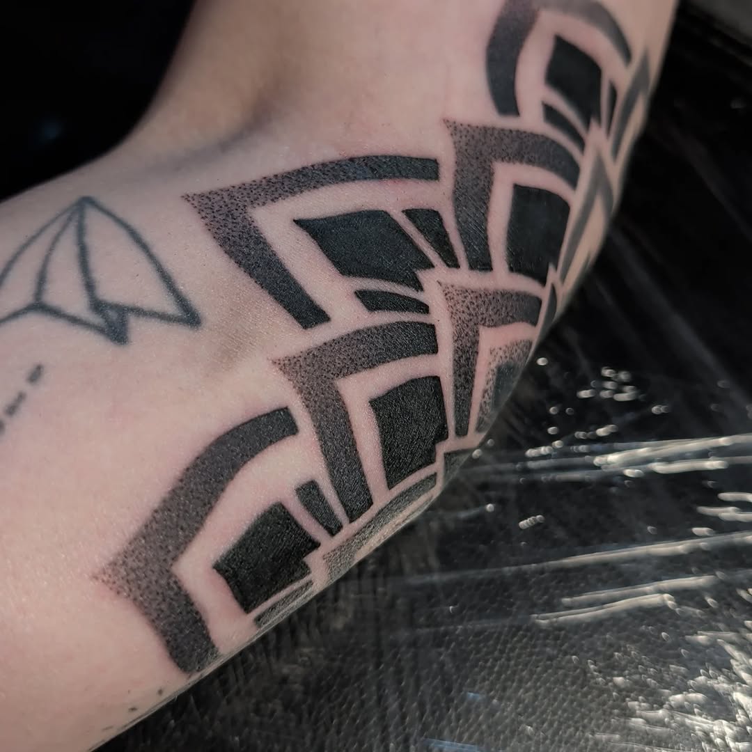 Tattoo by @heathstudiosandtattoo — geometric, dotwork