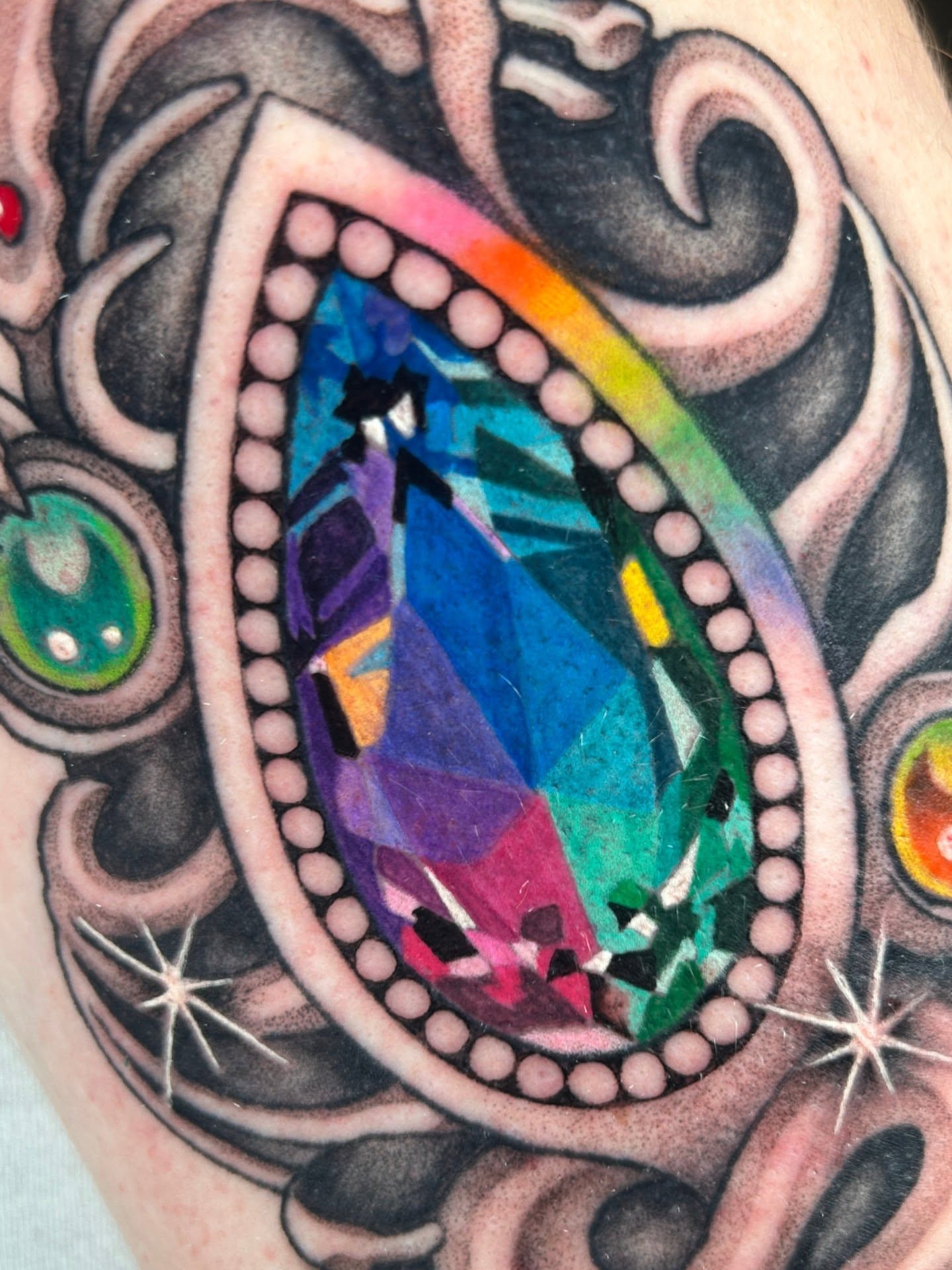 Gemstone geometric tattoo on the forearm by Chloe Marie