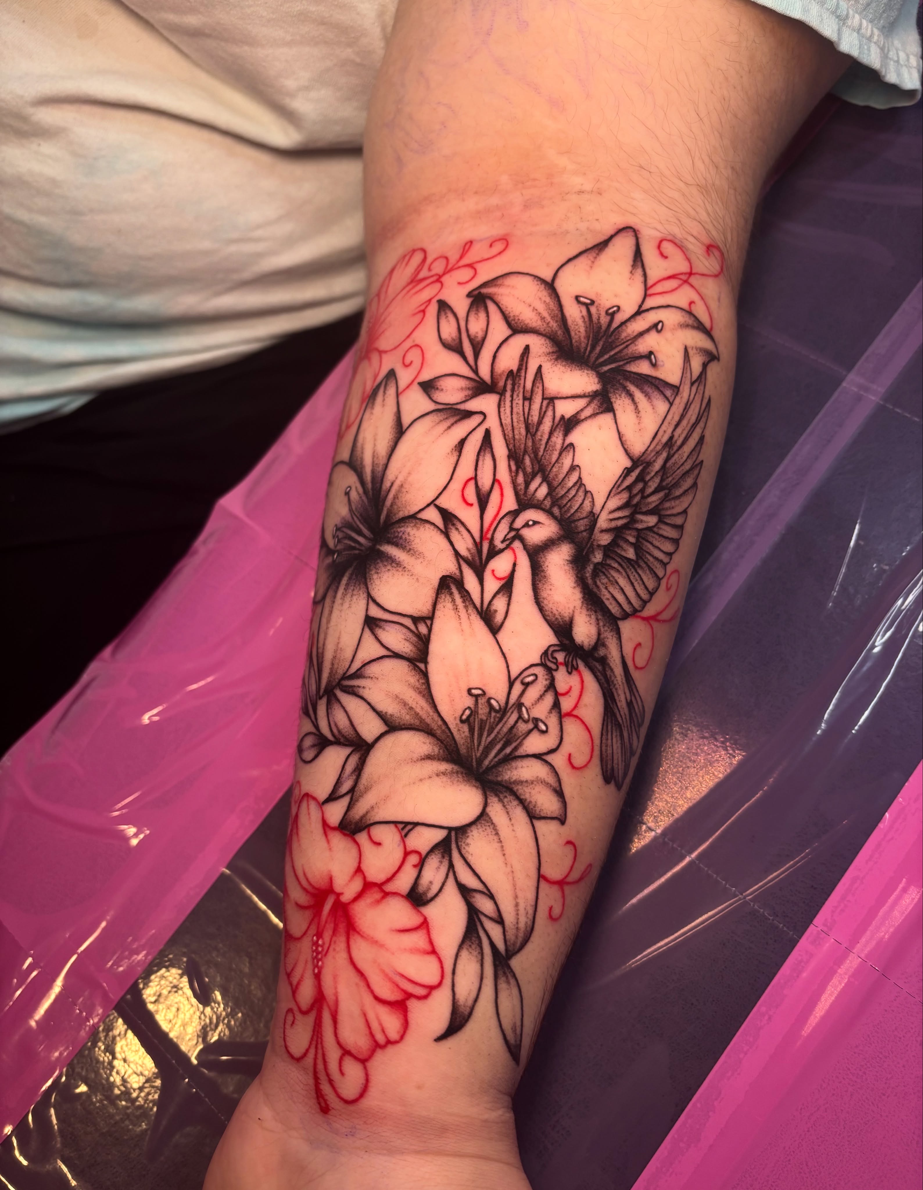 Lilies and hummingbird realism tattoo on the forearm by πππππππ ππππππ π¨πππππ