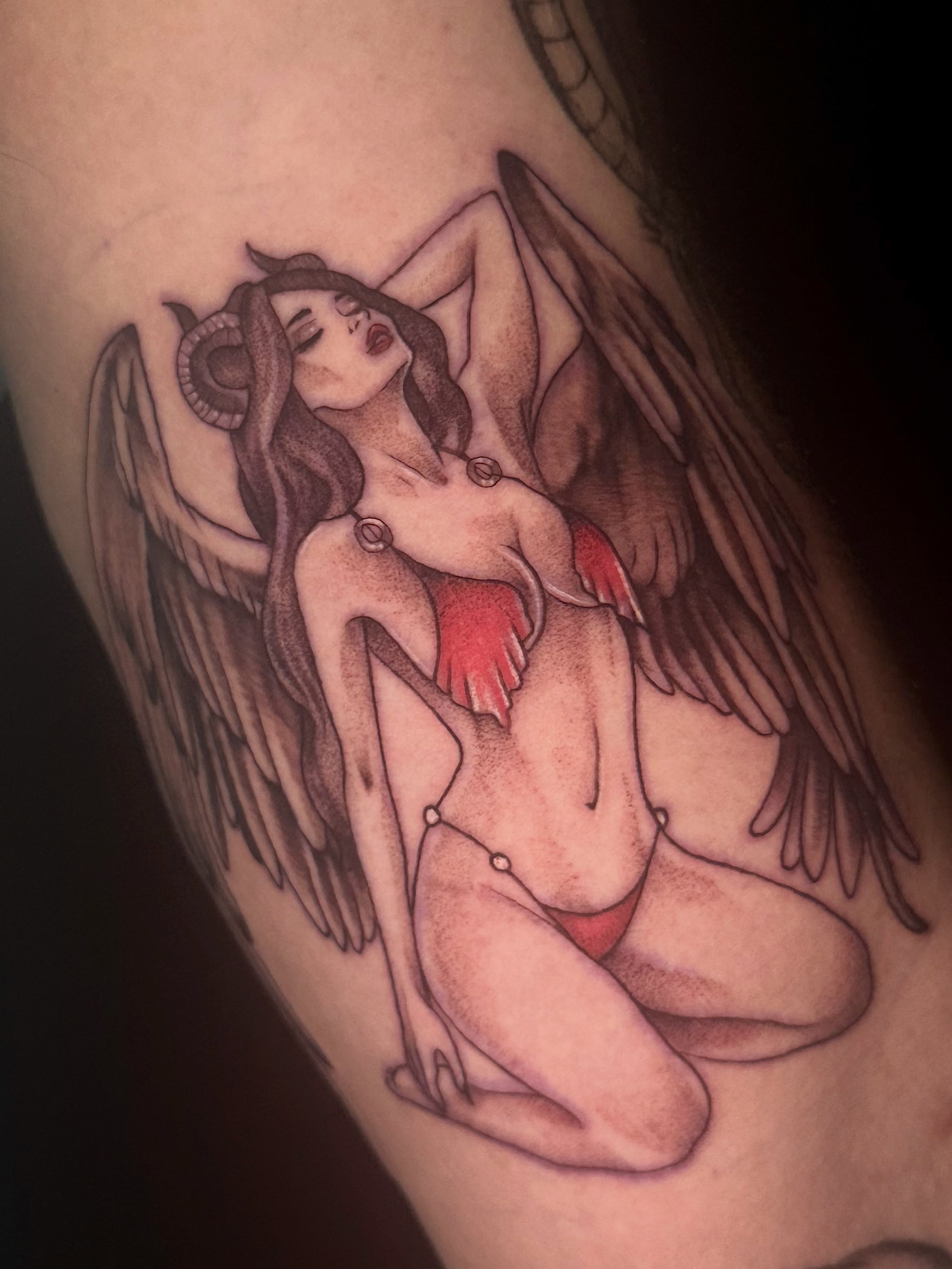 Naked angel with wings realism tattoo on the thigh by Exploitedtattoos