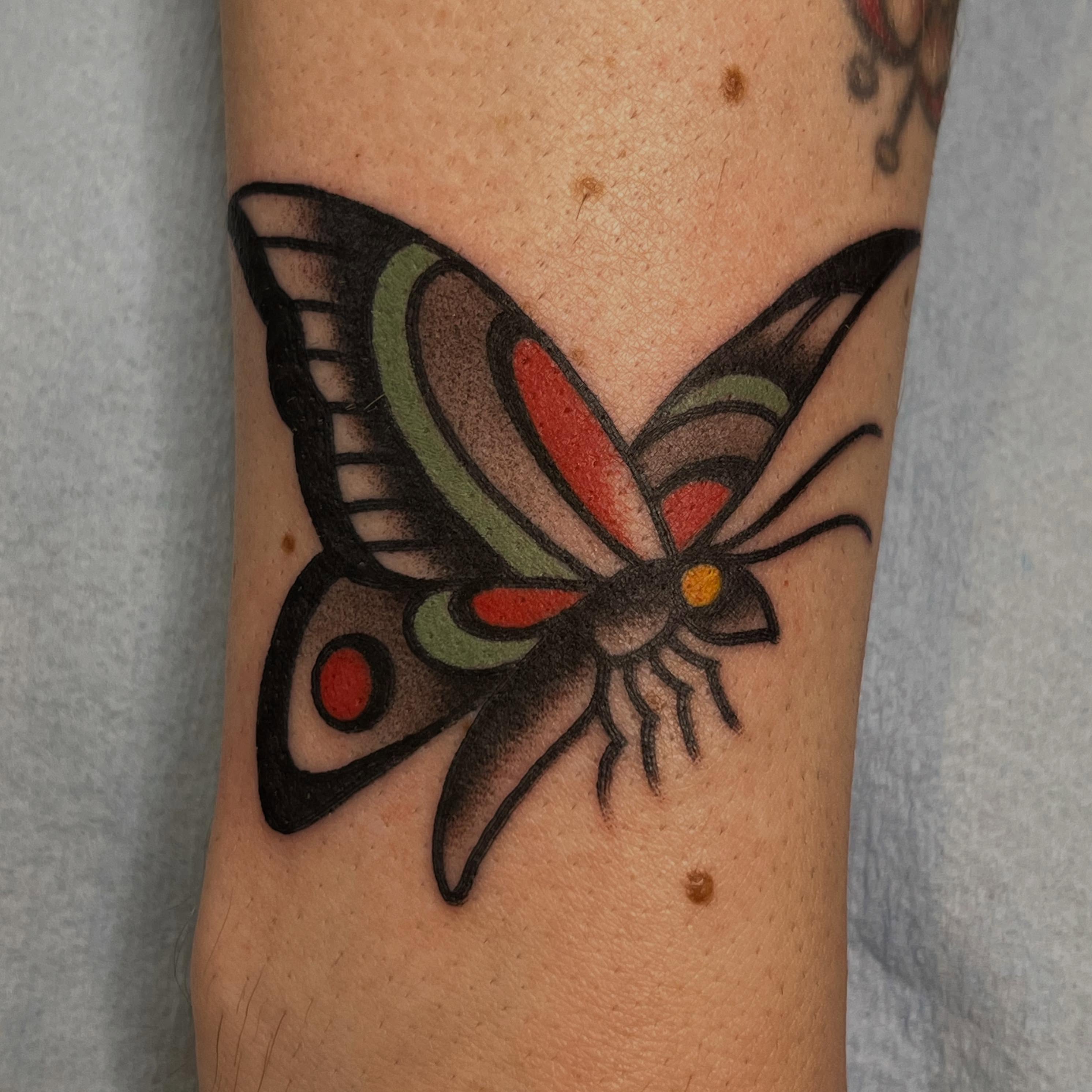Butterfly American traditional tattoo on the forearm by Kayla Gibson, Portland, Oregon