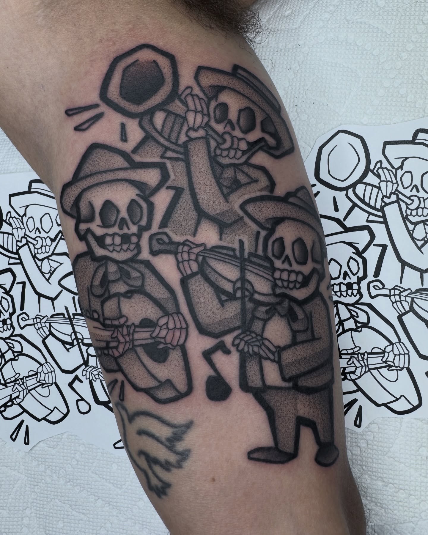 Musicians dotwork tattoo on the forearm by Donnie Moore