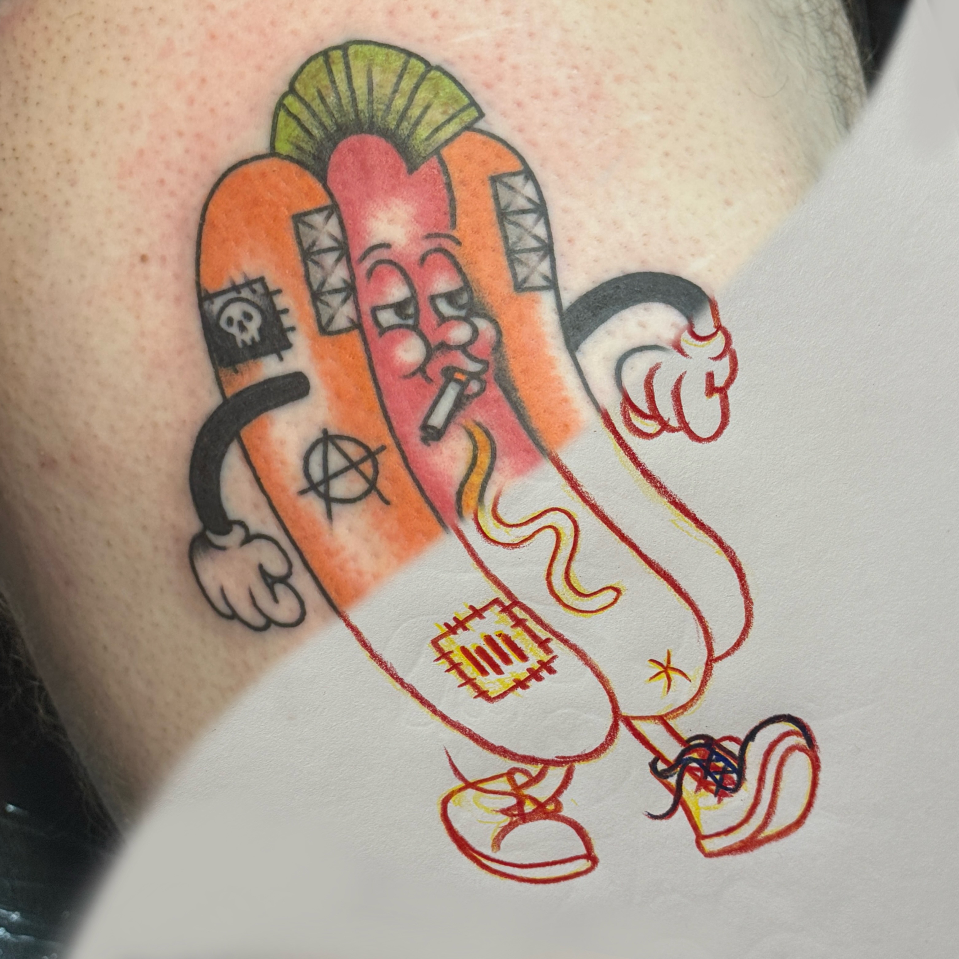 Hot dog American traditional tattoo on the upper arm by Traddy Maddie ๐