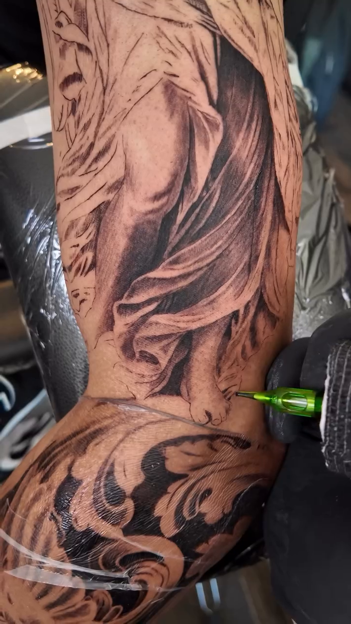 Tattoo by @carlos__macedo — realism, black_and_grey