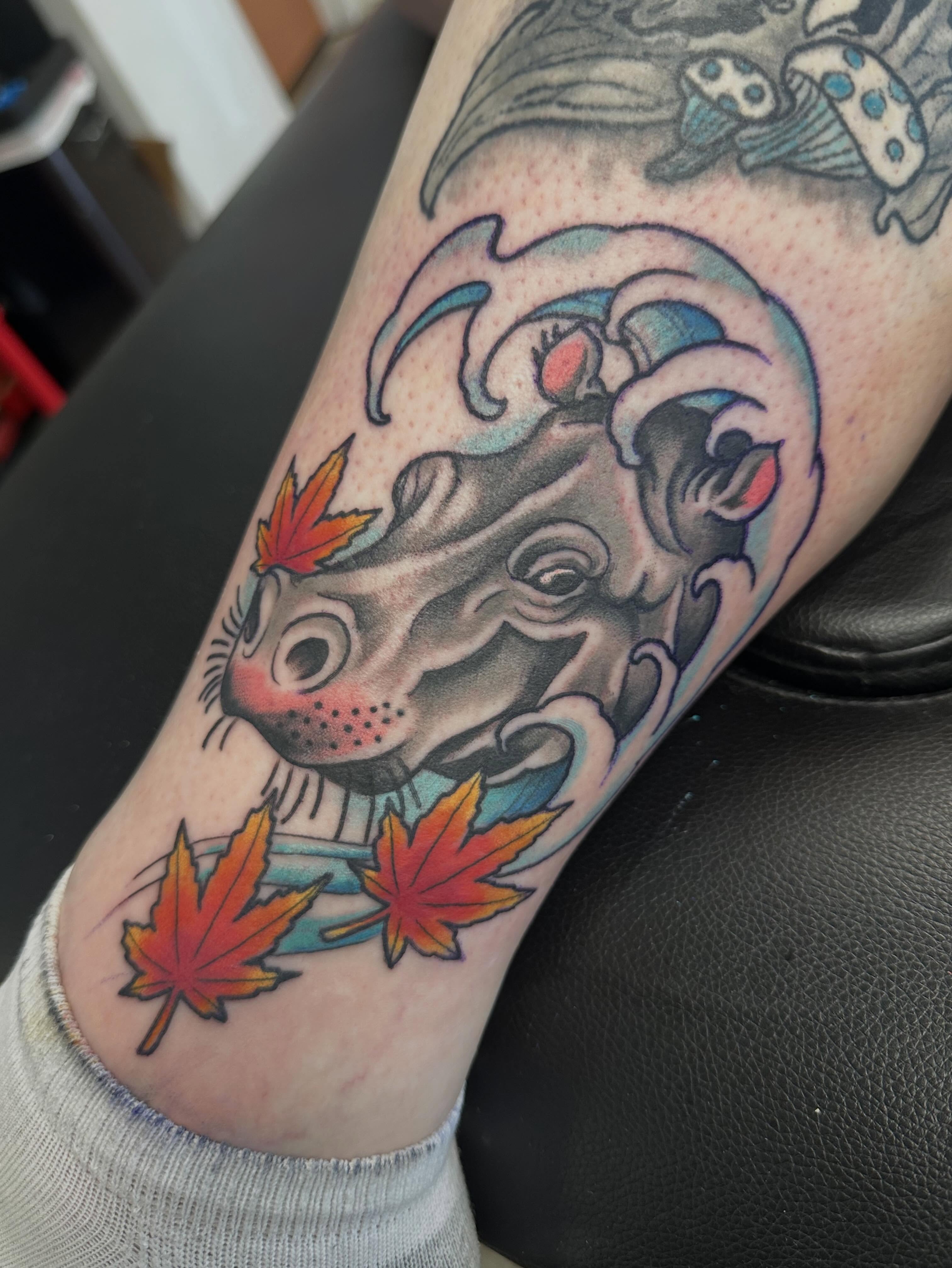 Ram head with maple leaves American traditional tattoo on the forearm by Vincent Merys