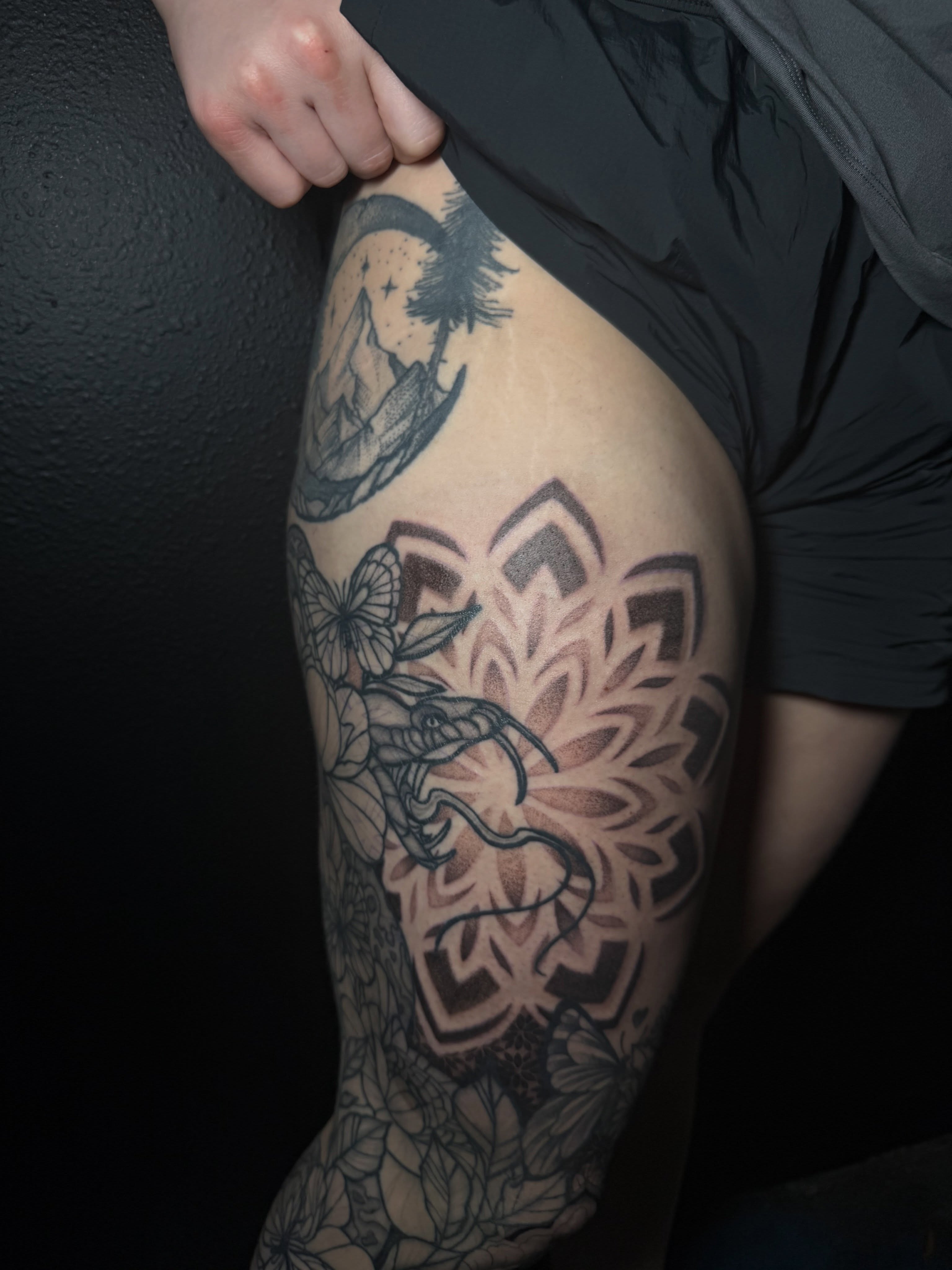 Elephant and floral dotwork tattoo on the thigh by Ink Darling, Carlisle, Iowa