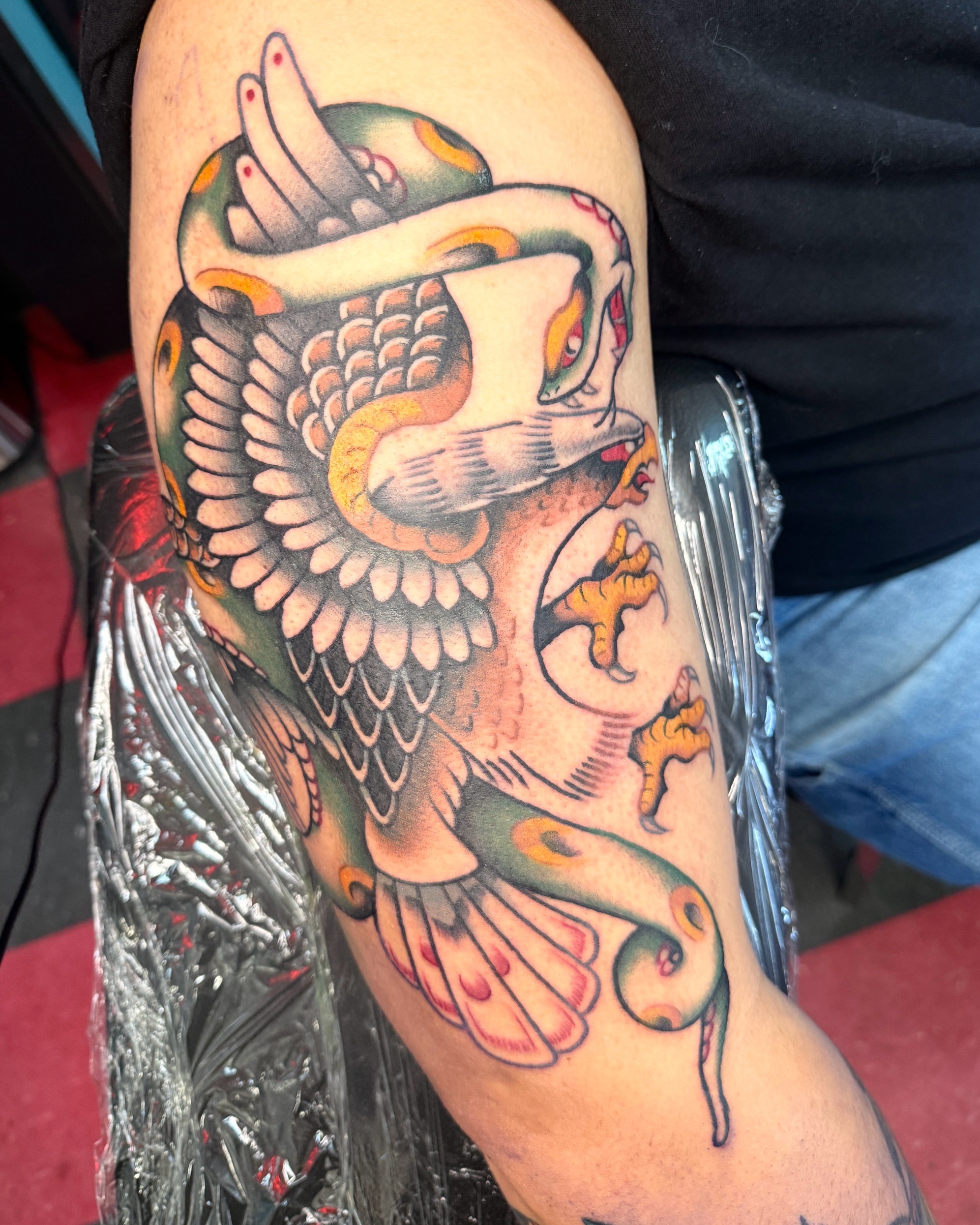 Koi fish American traditional tattoo on the forearm by Penny D Tattoos
