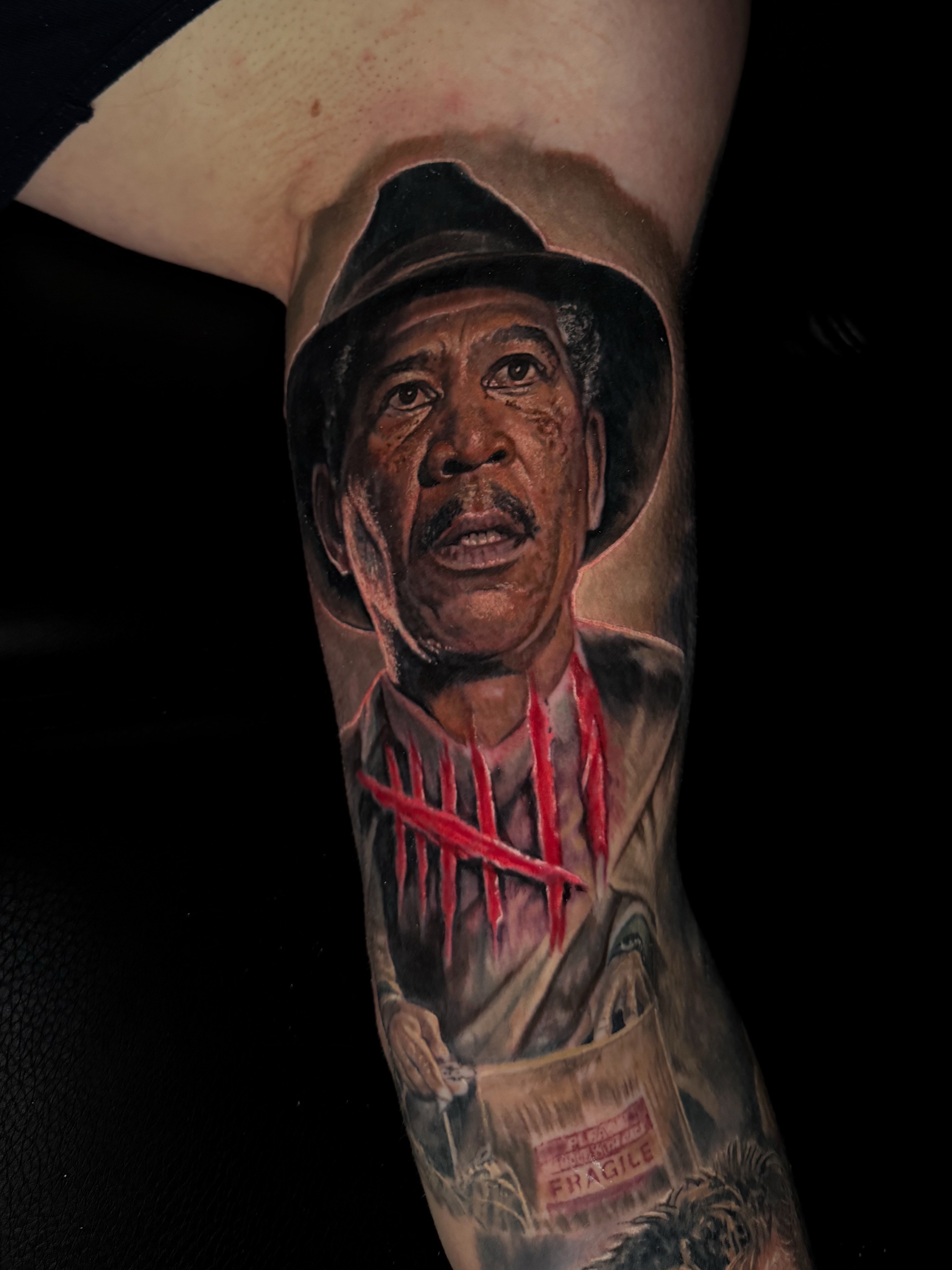 Morgan freeman realism tattoo on the forearm by Dave James