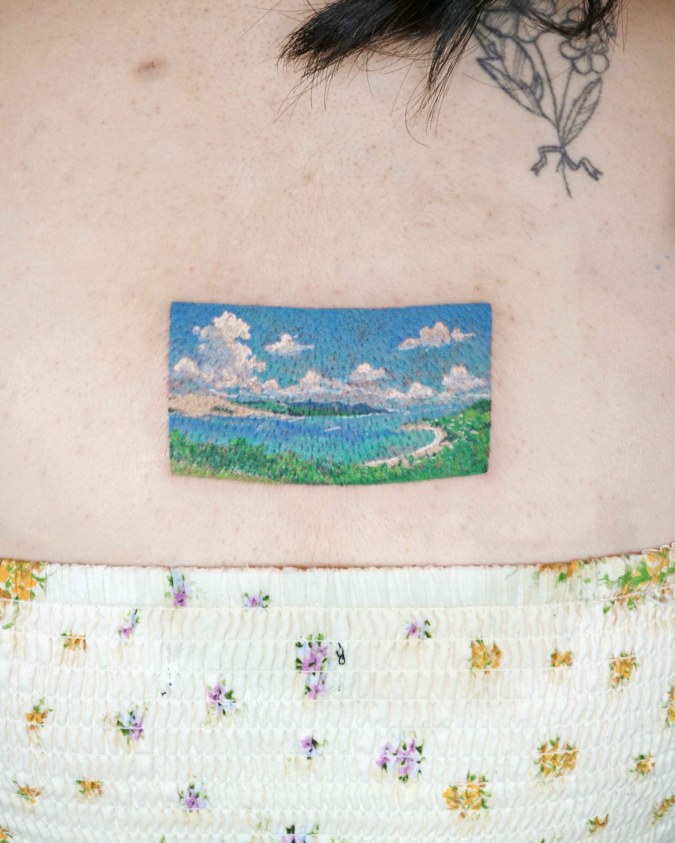 Landscape realism tattoo on the back by Aroha