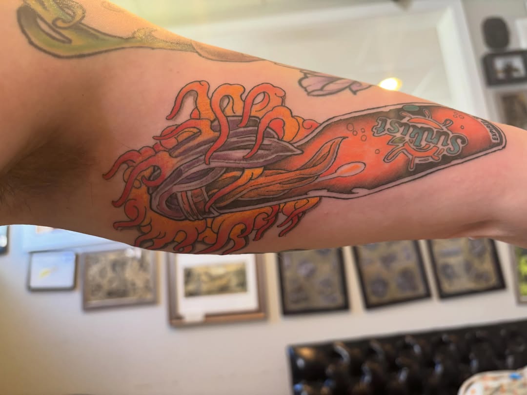 Spaghetti and lobster American traditional tattoo on the forearm by Kevin Berube