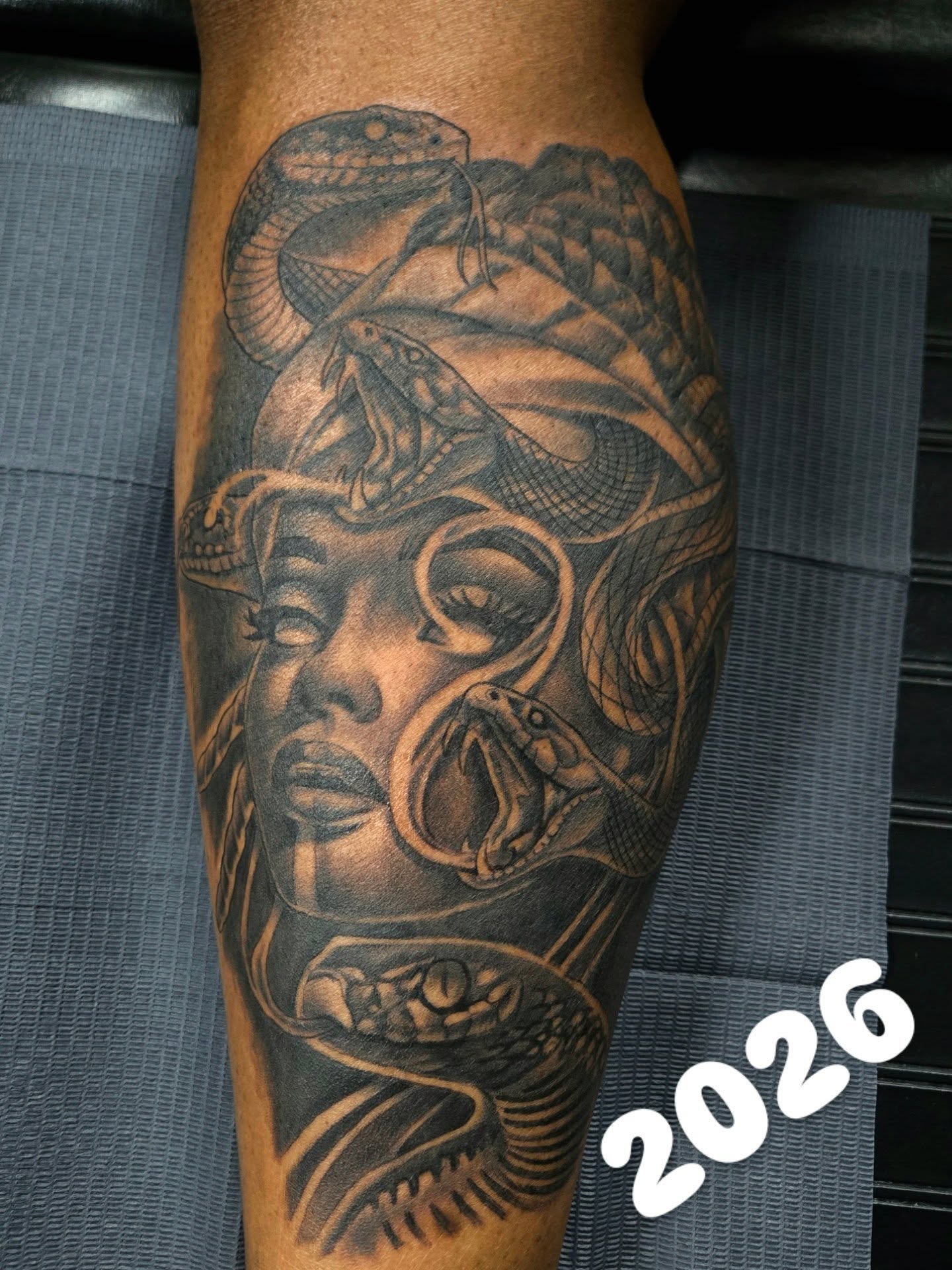 Woman with snakes realism tattoo on the forearm by Cee Vann, Greensboro, North Carolina
