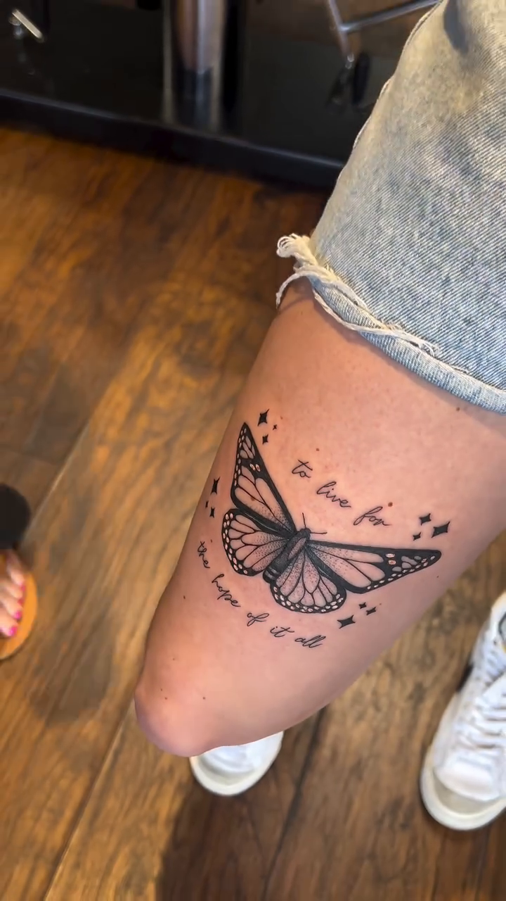 Butterfly and text fine line tattoo by Ricky Myotte