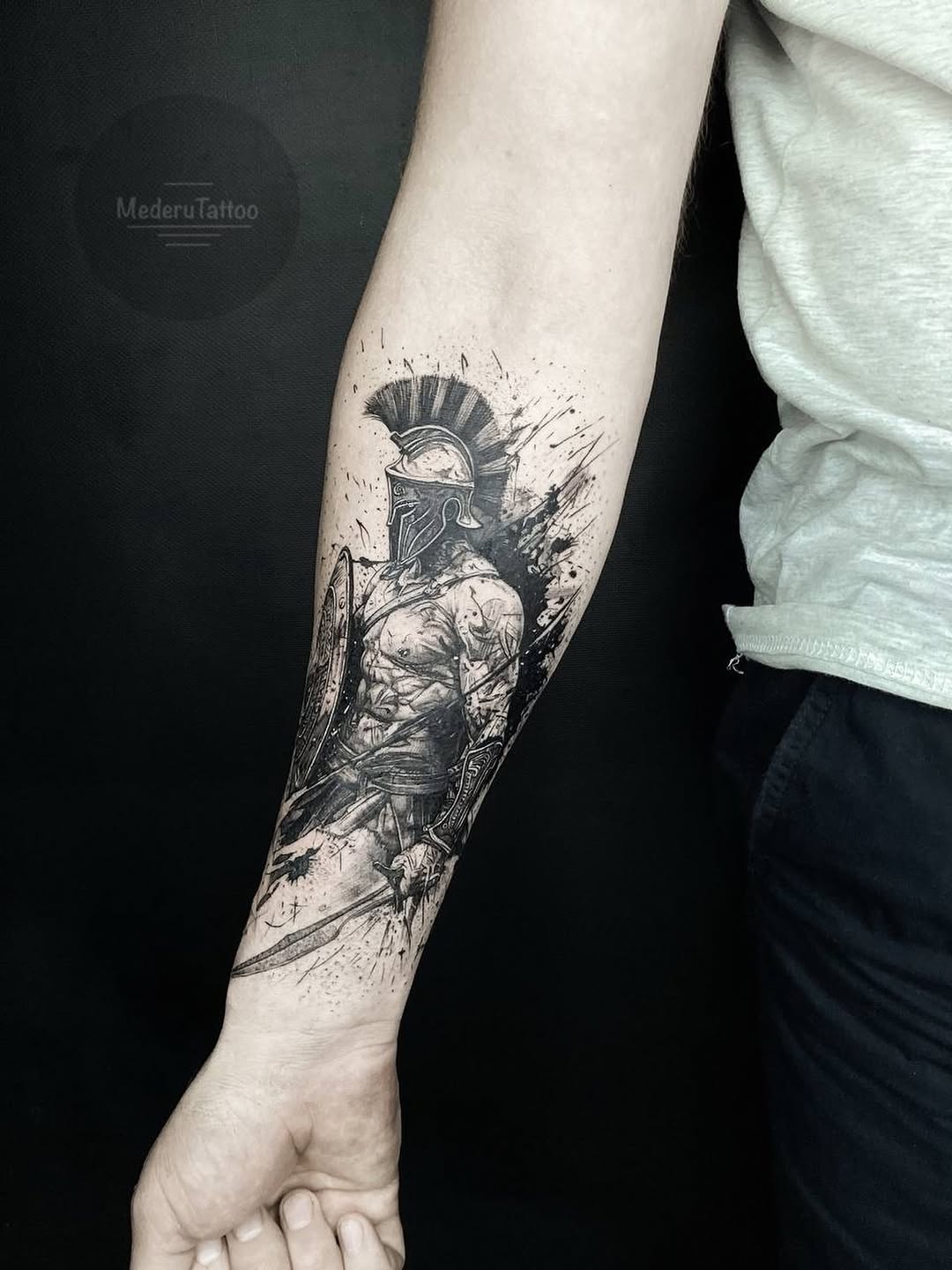 Spartan warrior realism tattoo on the forearm by Alexey Molyarenko