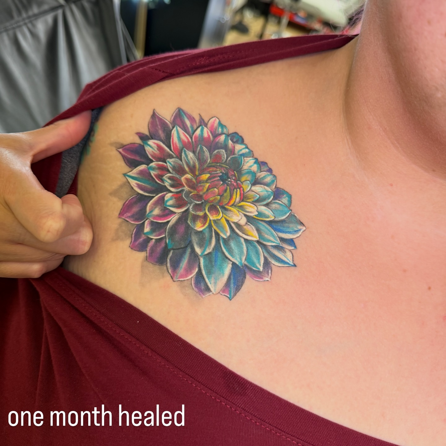 Flower realism tattoo on the shoulder by Dani Fried Tattoos