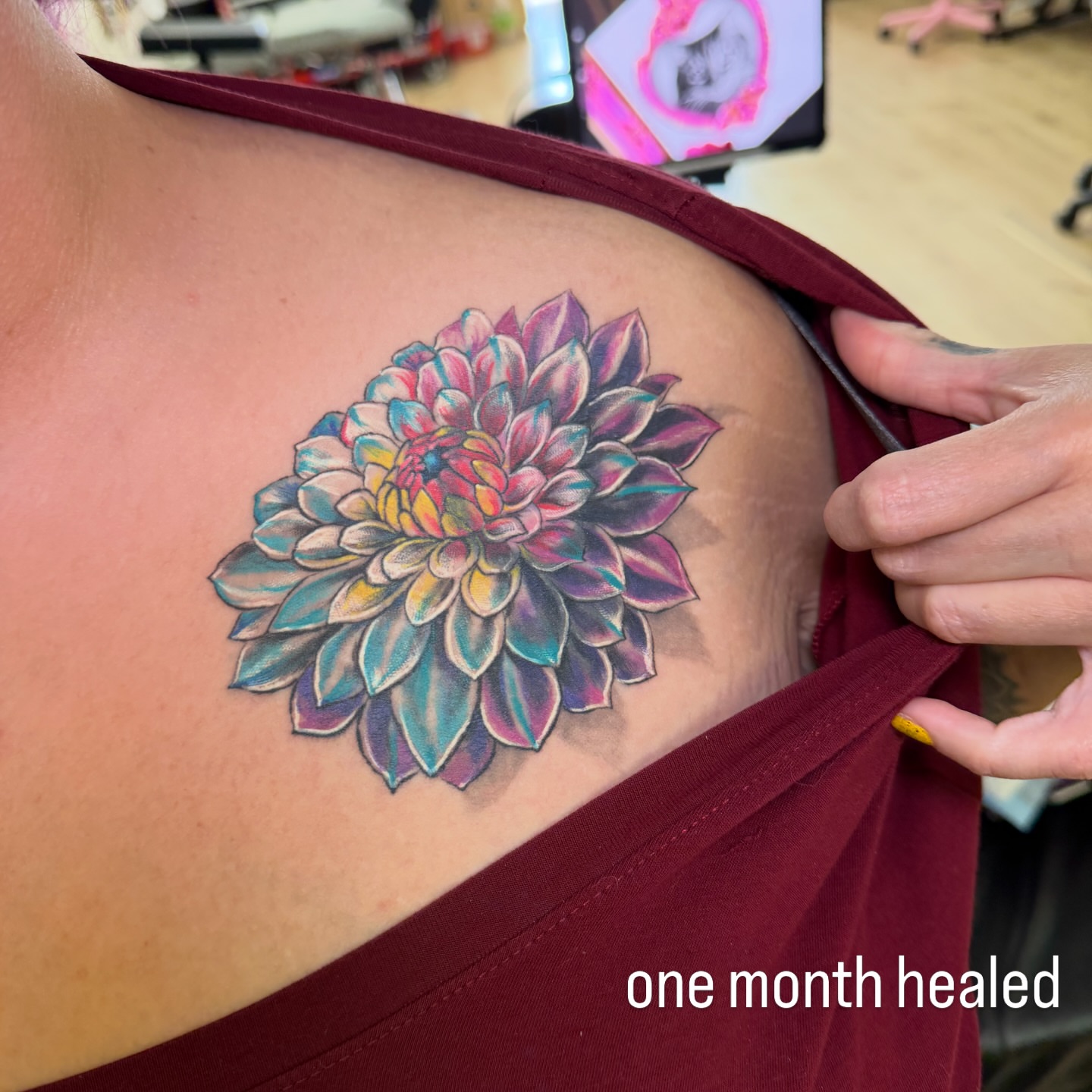 Flower realism tattoo on the shoulder by Dani Fried Tattoos