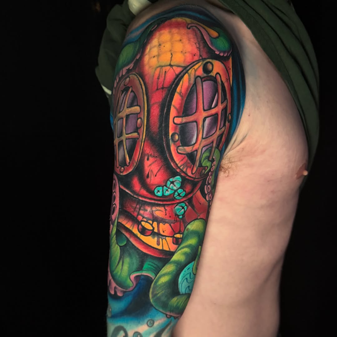 Diving helmet realism tattoo on the shoulder by JoshUA Bowers, Des Moines, Iowa