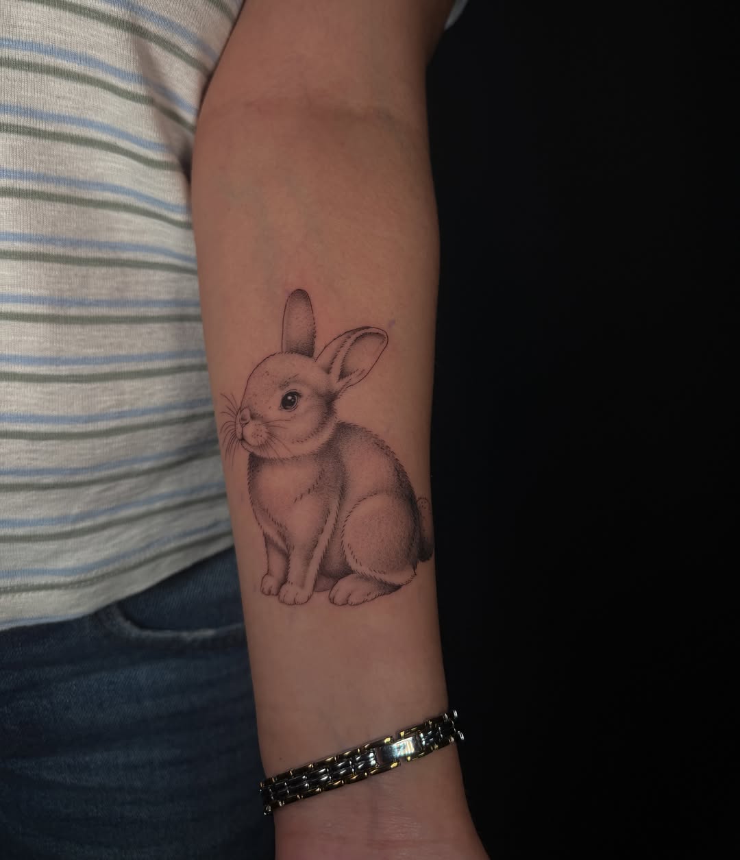 Rabbit realism tattoo on the forearm by Marianne