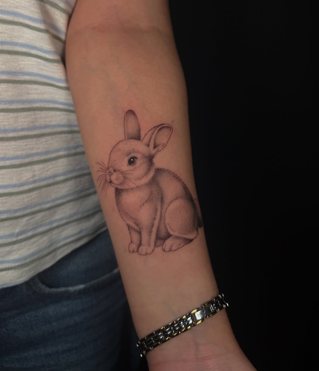 Rabbit realism tattoo on the forearm by Marianne