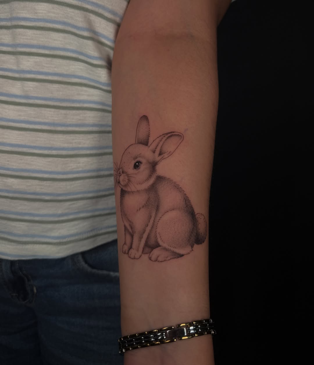 Rabbit realism tattoo on the forearm by Marianne
