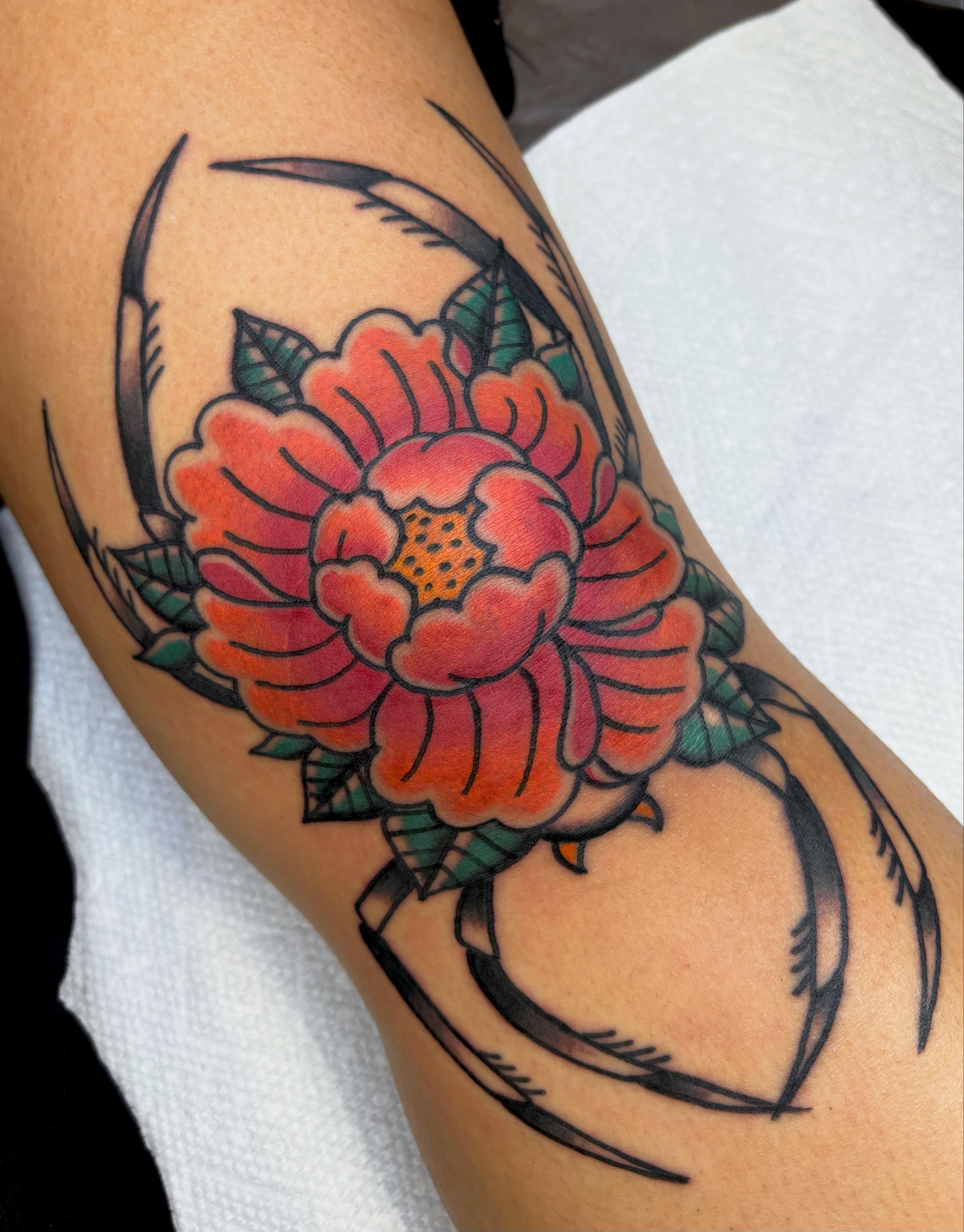 Peony flower American traditional tattoo on the thigh by @rutattoos
