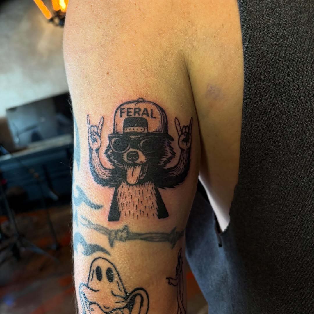Feral dog American traditional tattoo on the forearm by destany aguilera, Davenport, Iowa